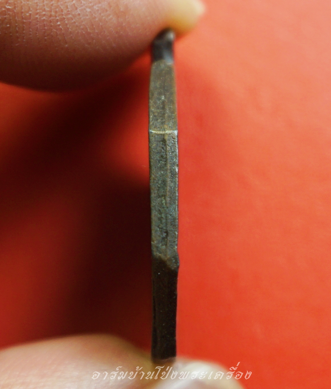 หลวงพ่อแป๊ะ วัดสว่างอารมณ์ เหรียญแปดเหลี่ยม ด้านหน้ายันต์นกสาริกา หลังยันต์เก้าแถว(องค์ที่1)