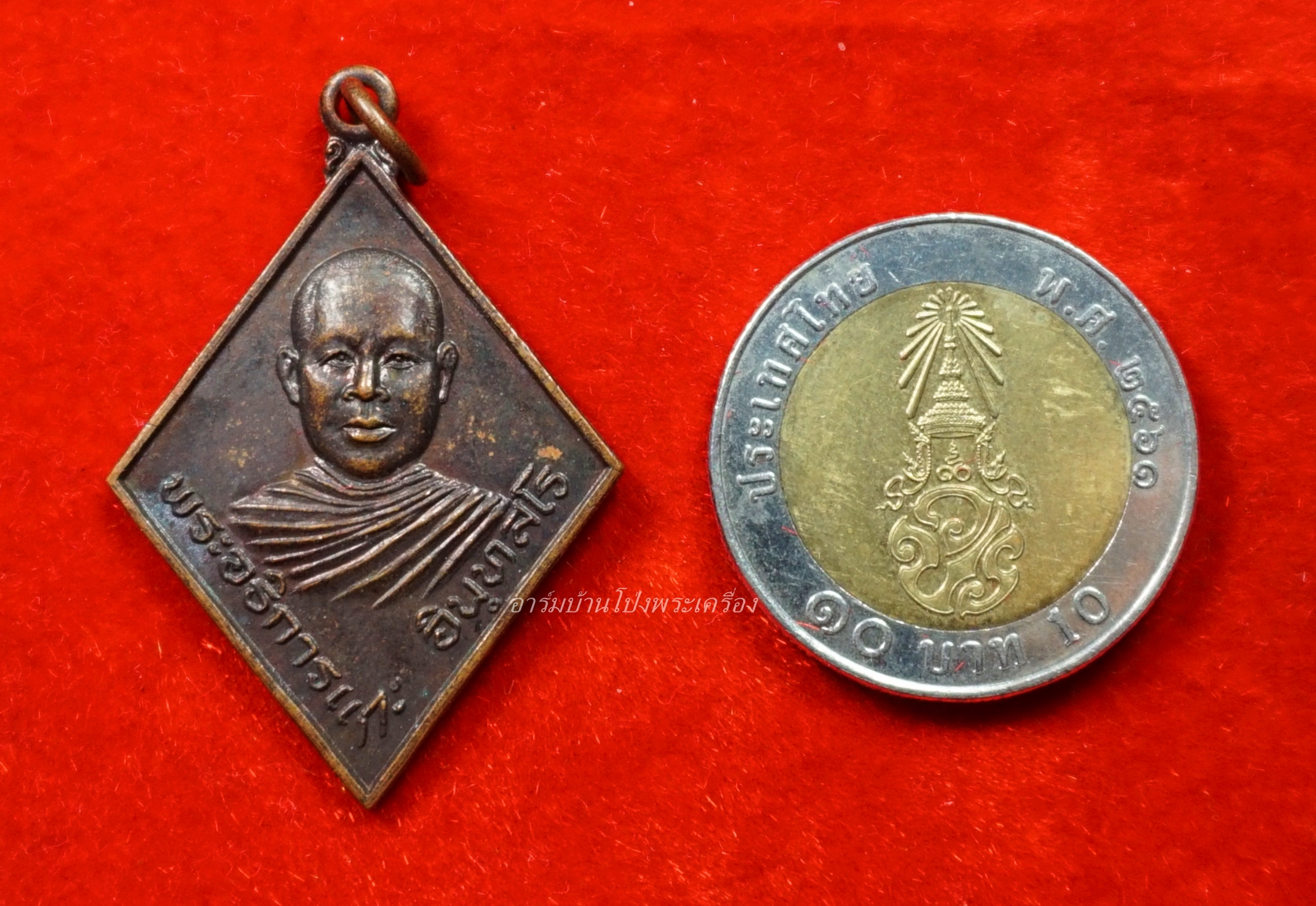 พระอธิการแกะ วัดเลาเต่า เนื้อทองแดง(องค์ที่1)