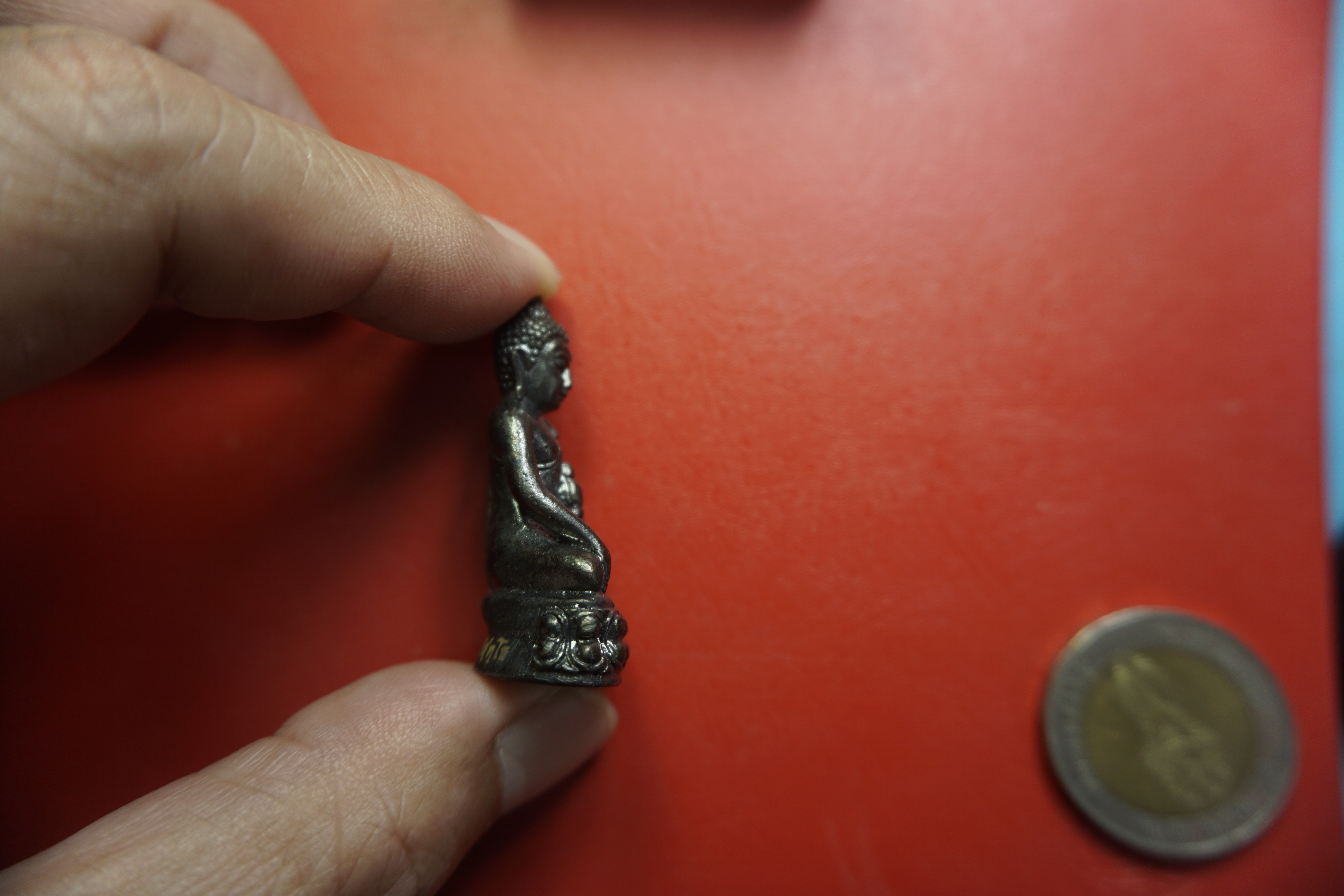 หลวงพ่อคูณ วัดบ้านไร่ พระกริ่งเฉลิมพลปริสุทโธ พีธีพุทธาภิเษก ปี๒๕๕๗ ยิงโค๊ตและหมายเลข๒๐๖๕๐(องค์ที่1)