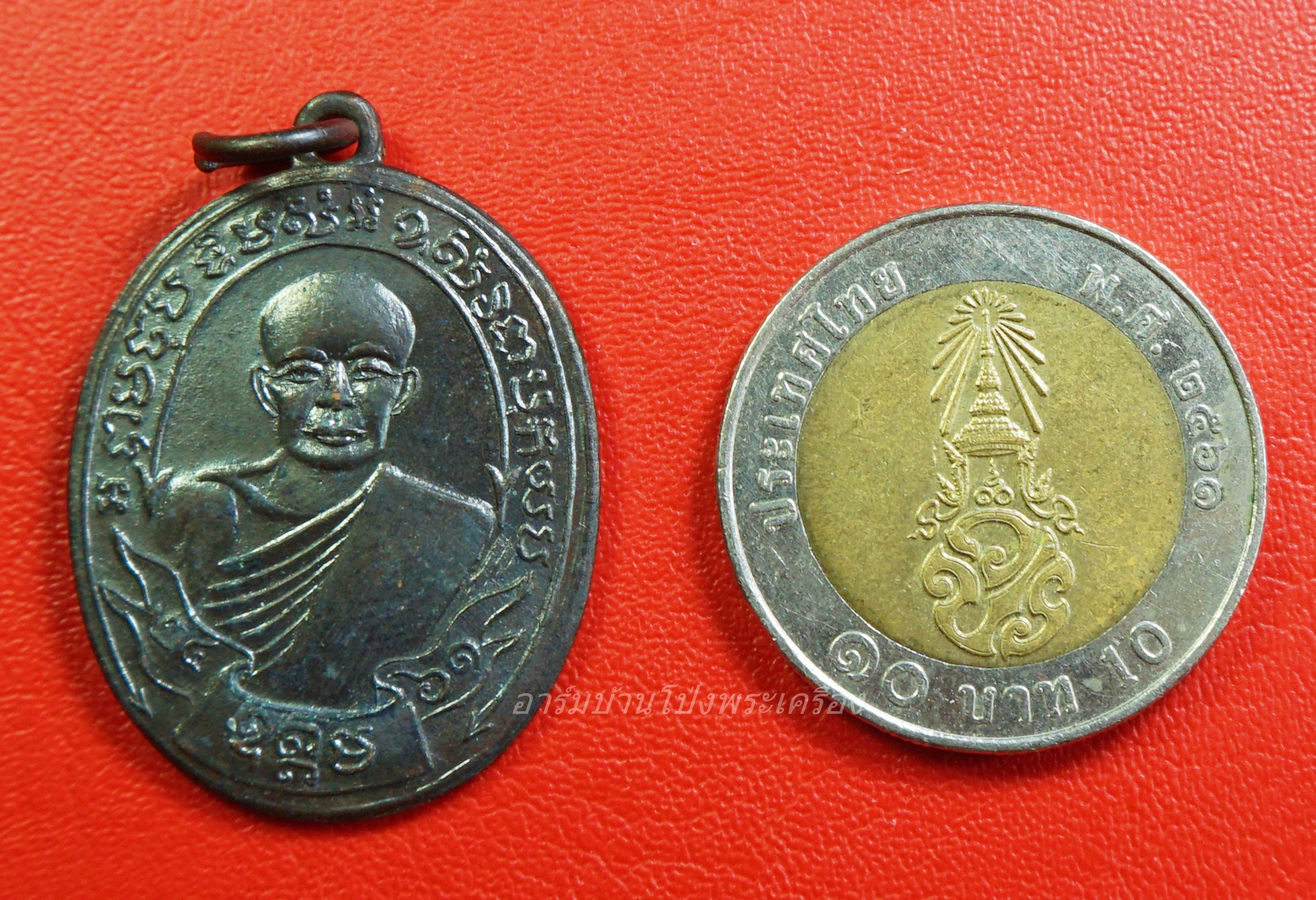 หลวงพ่อฟัก วัดบ้านโป่ง พิธีปลุกเสกพร้อมพระแก้วมรกต ปี๒๕๐๙ เนื้อทองแดงรมดำ(องค์ที่1)