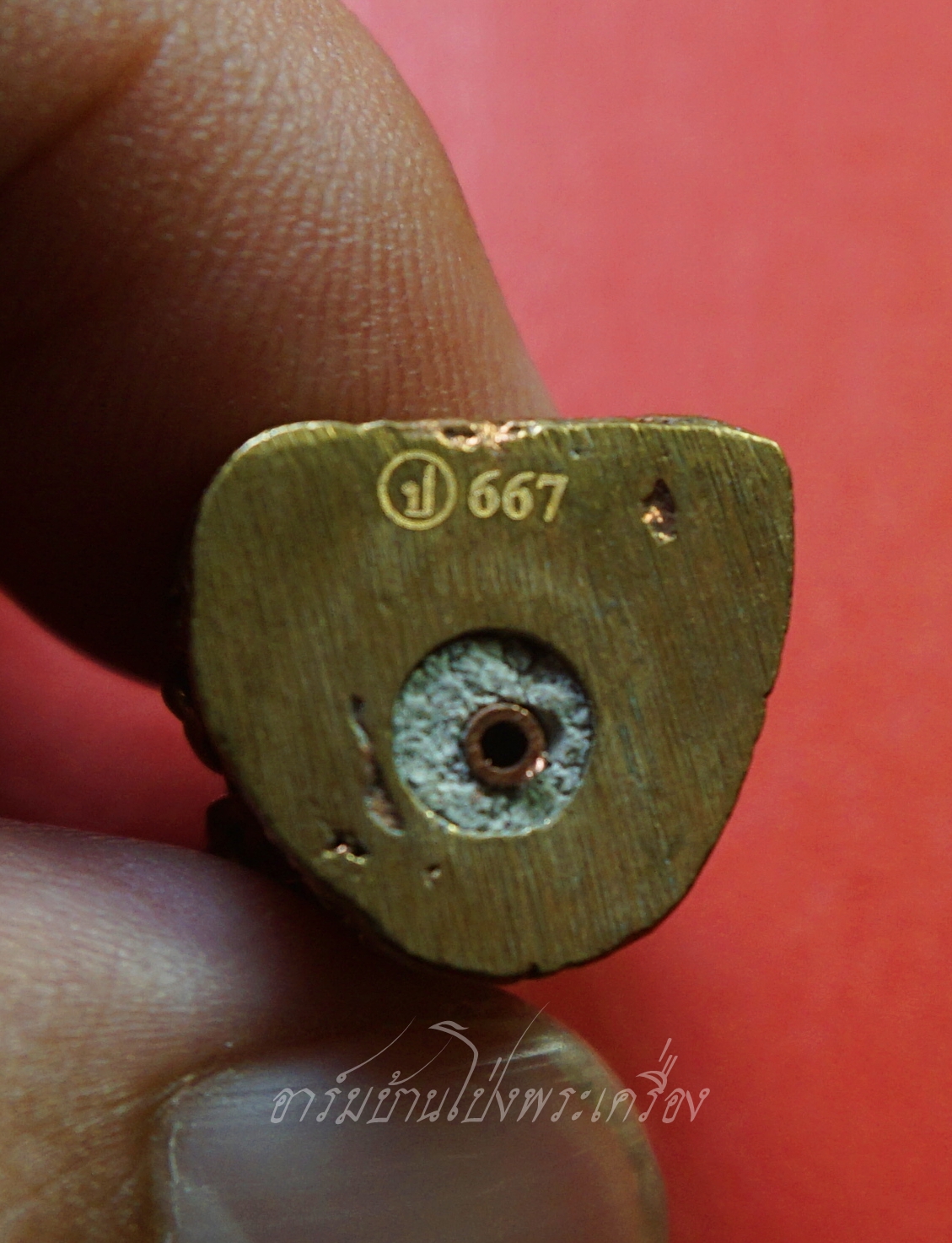 หลวงพ่อโปร่ง วัดถ้ำพรุตะเคียน จ.ชุมพร รูปหล่อยันต์ยุ่ง ก้นอุดผงพุทธคุณ ฝังตะกรุด เนื้อทองแดง เลข667(องค์ที่2)