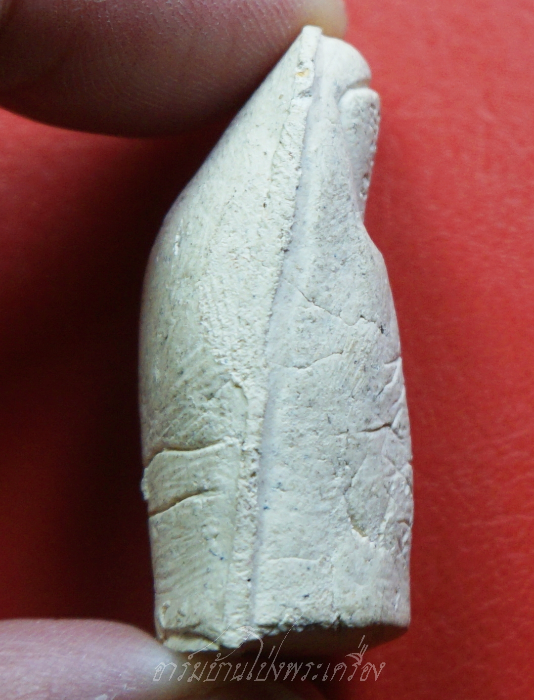 หลวงพ่อคูณ วัดบ้านไร่ นิ้วโป้งจำลอง ลงอักขระยันต์ ปี๒๕๓๖ เนื้อผง(องค์ที่16)