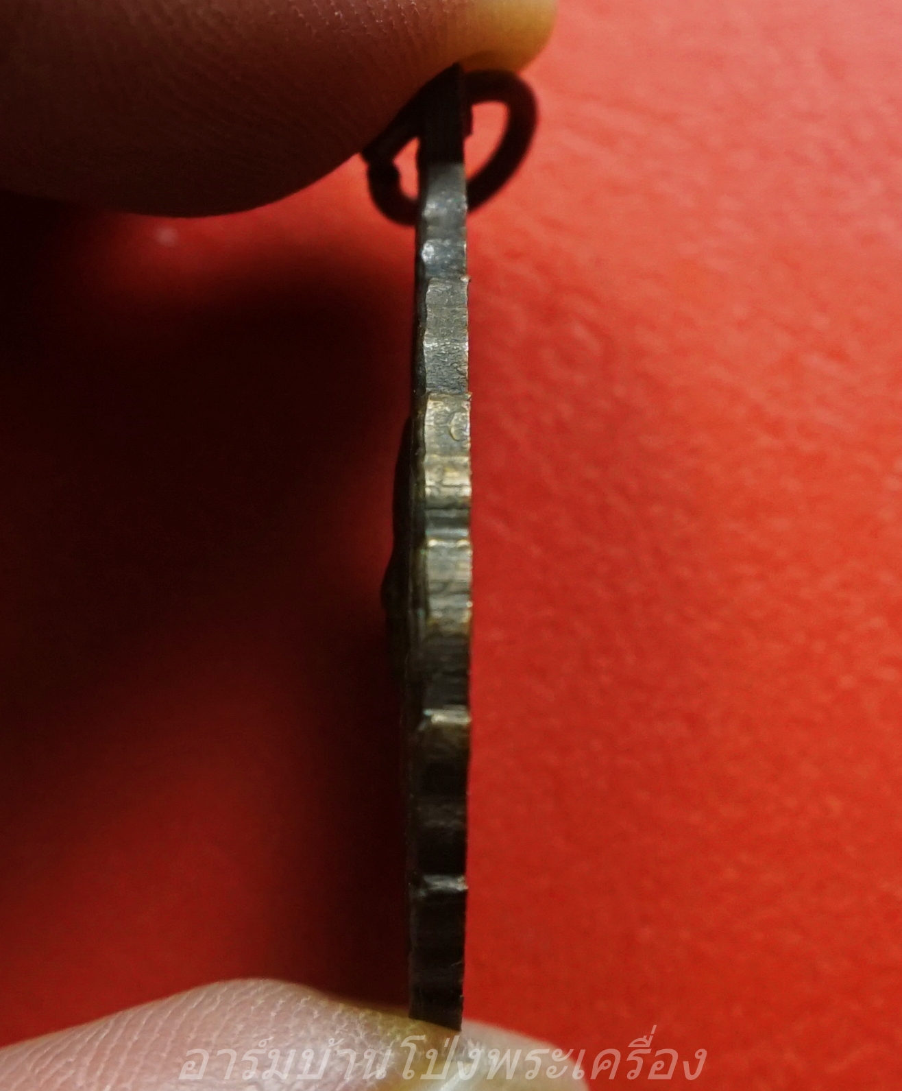 พระครูโกศลธรรมวัฒน์(หลวงพ่อคลิม) วัดชำแระ จ.ศรีสะเกษ รุ่น๑ เนื้อทอแดงรมดำ(องค์ที่1)