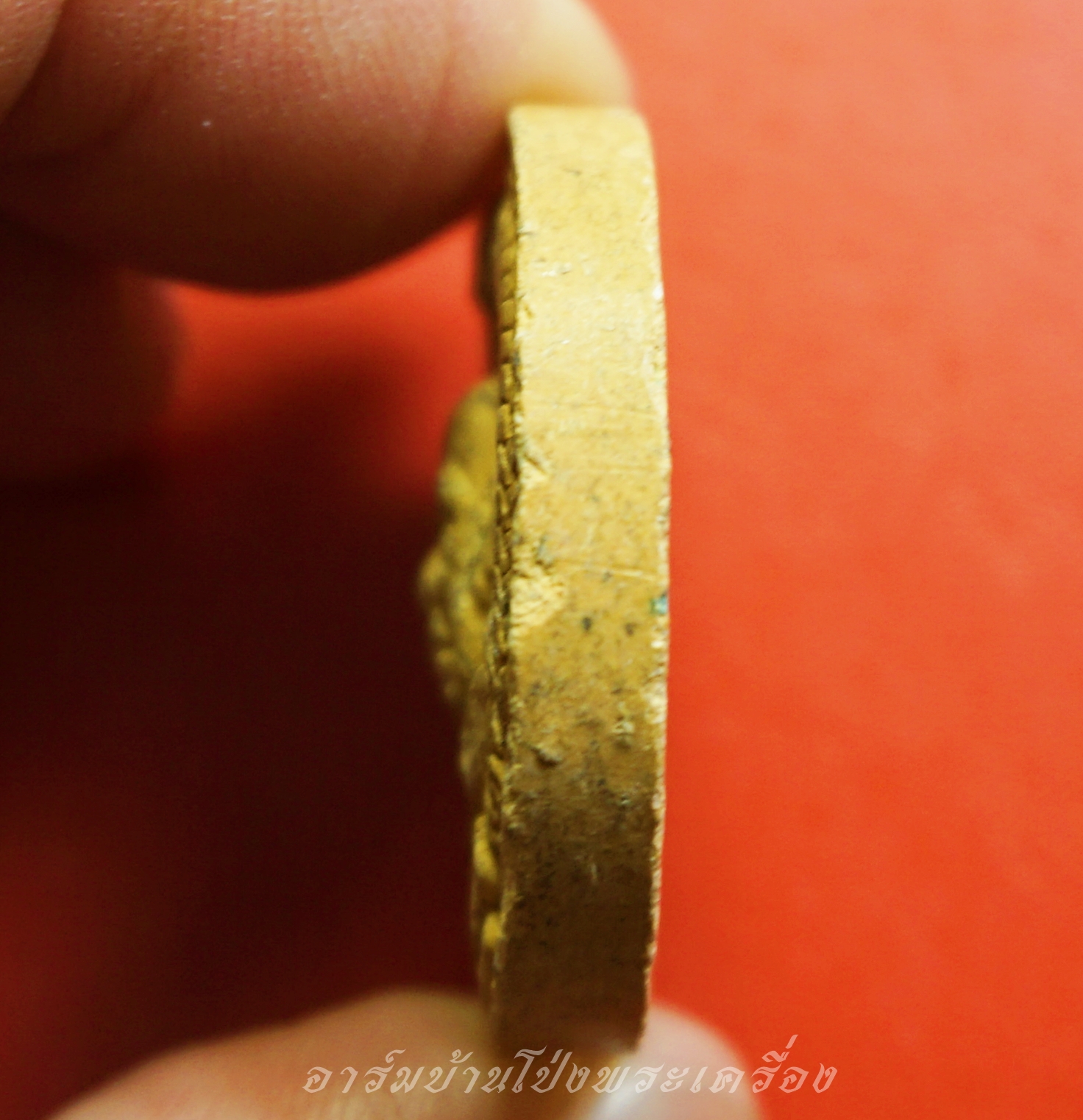 หลวงปู่แผ้ว วัดกำแพงแสน เนื้อผงสีเหลือง(องค์ที่2)