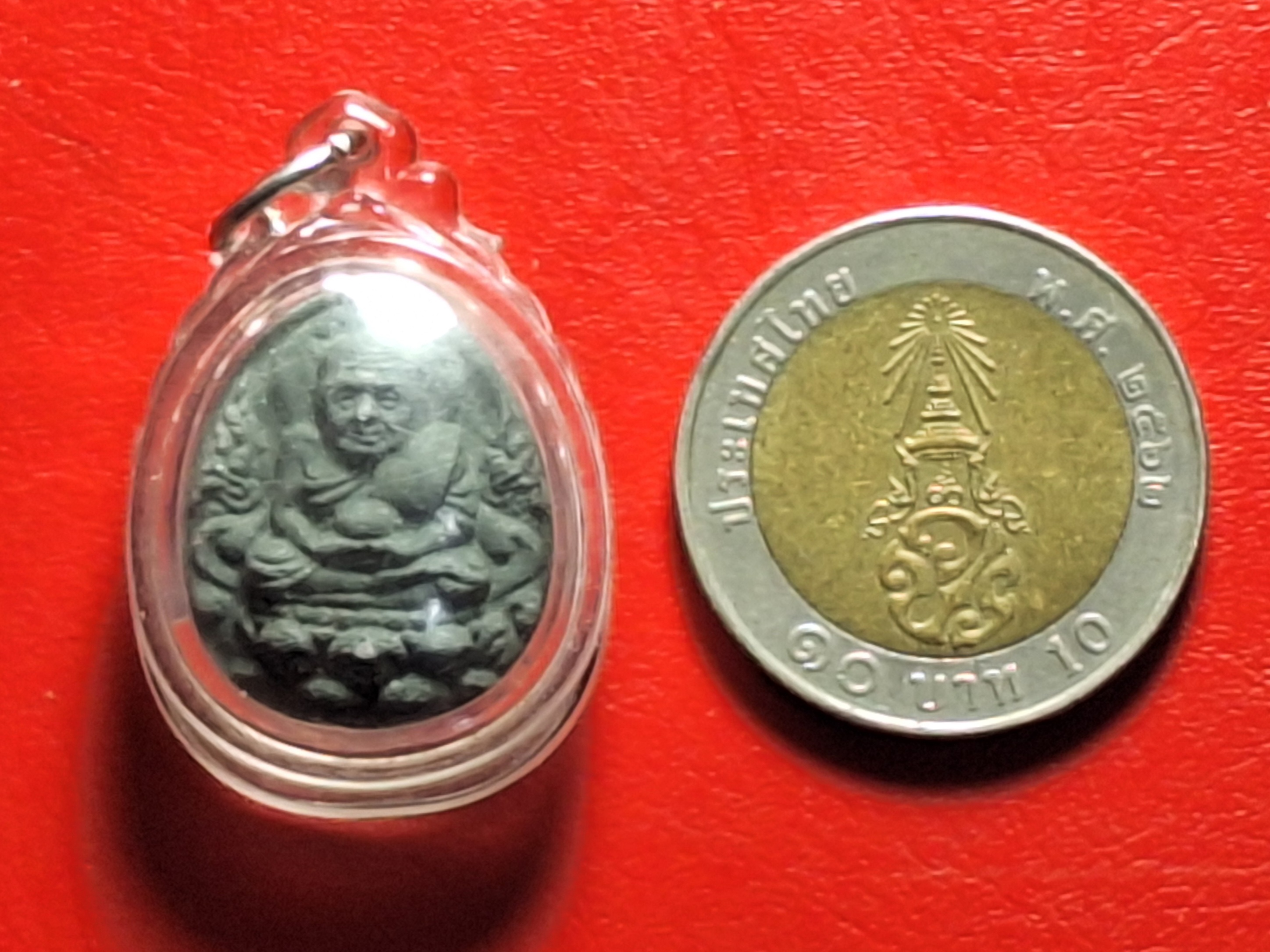 หลวงพ่อจำเนียร วัดเขาหลาว จ.ราชบุรี หลวงปู่ทวด หลังพญาครุฑ พิมพ์เล็ก ปี๒๕๕๕ เลี่ยมเดิม(องค์ที่1)