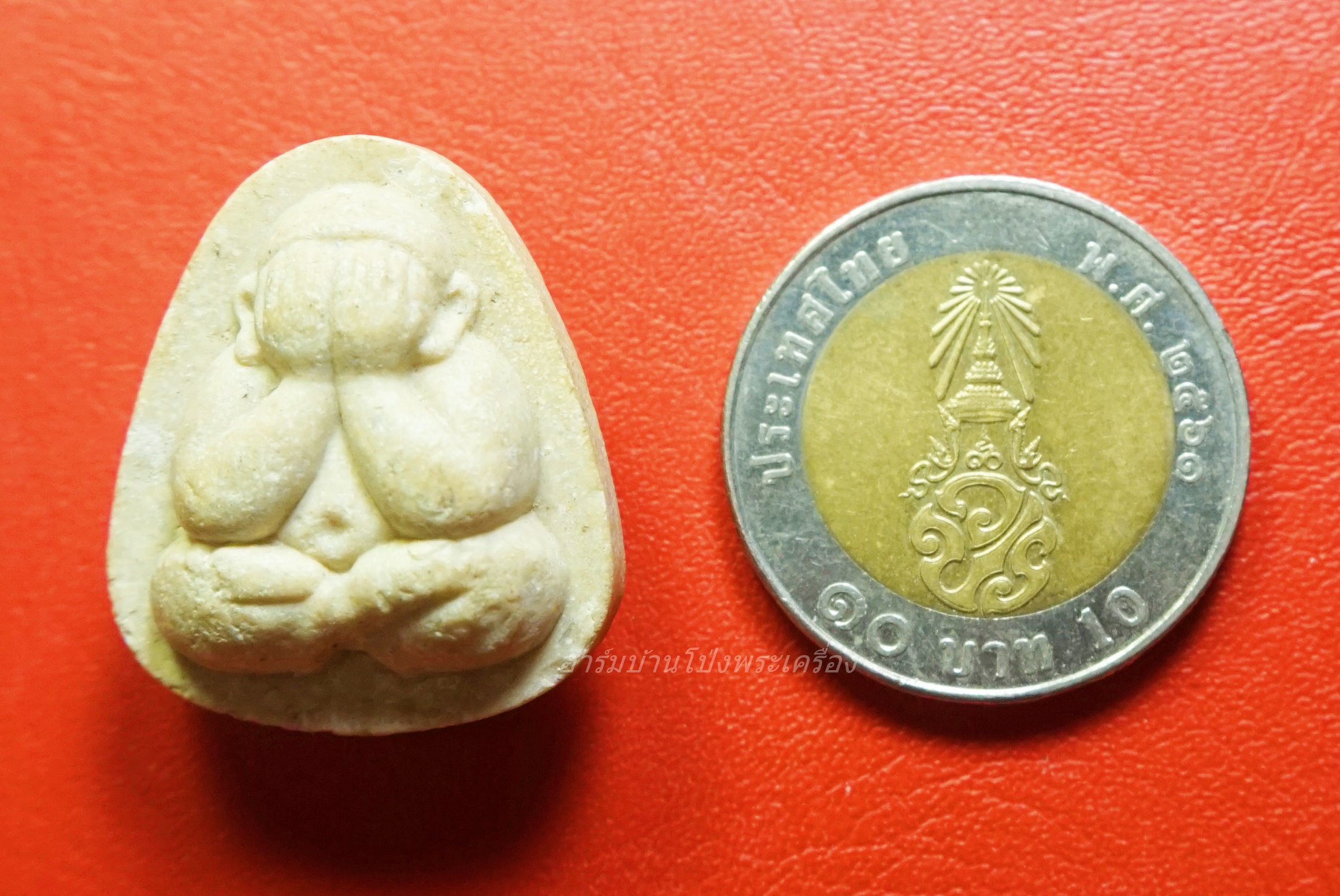 พระปิดตา หลวงพ่อน้อย วัดธรรมศาลา หลังราหู อมจันทร์ เนื้อผงสีขาว(องค์ที่1)