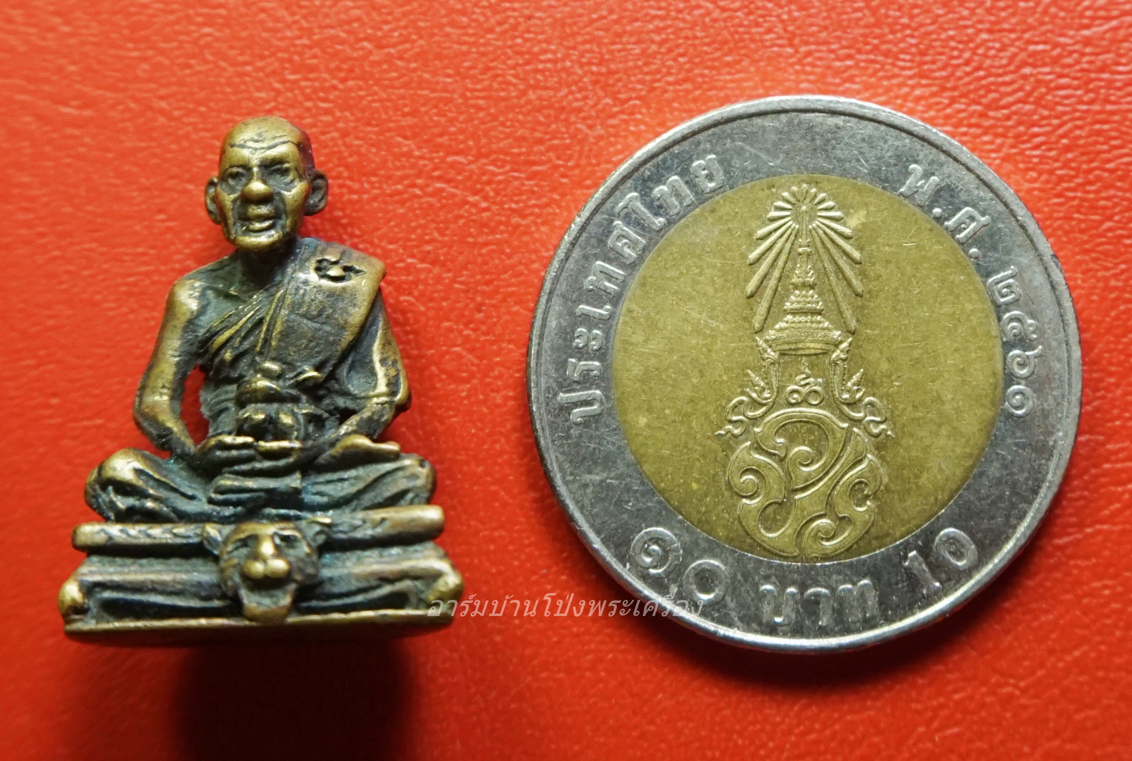 หลวงพ่อเปิ่น วัดบางพระ รูปหล่อนั่งหัวเสือ ปี๒๕๓๐ เนื้อทองเหลือง(องค์ที่1)