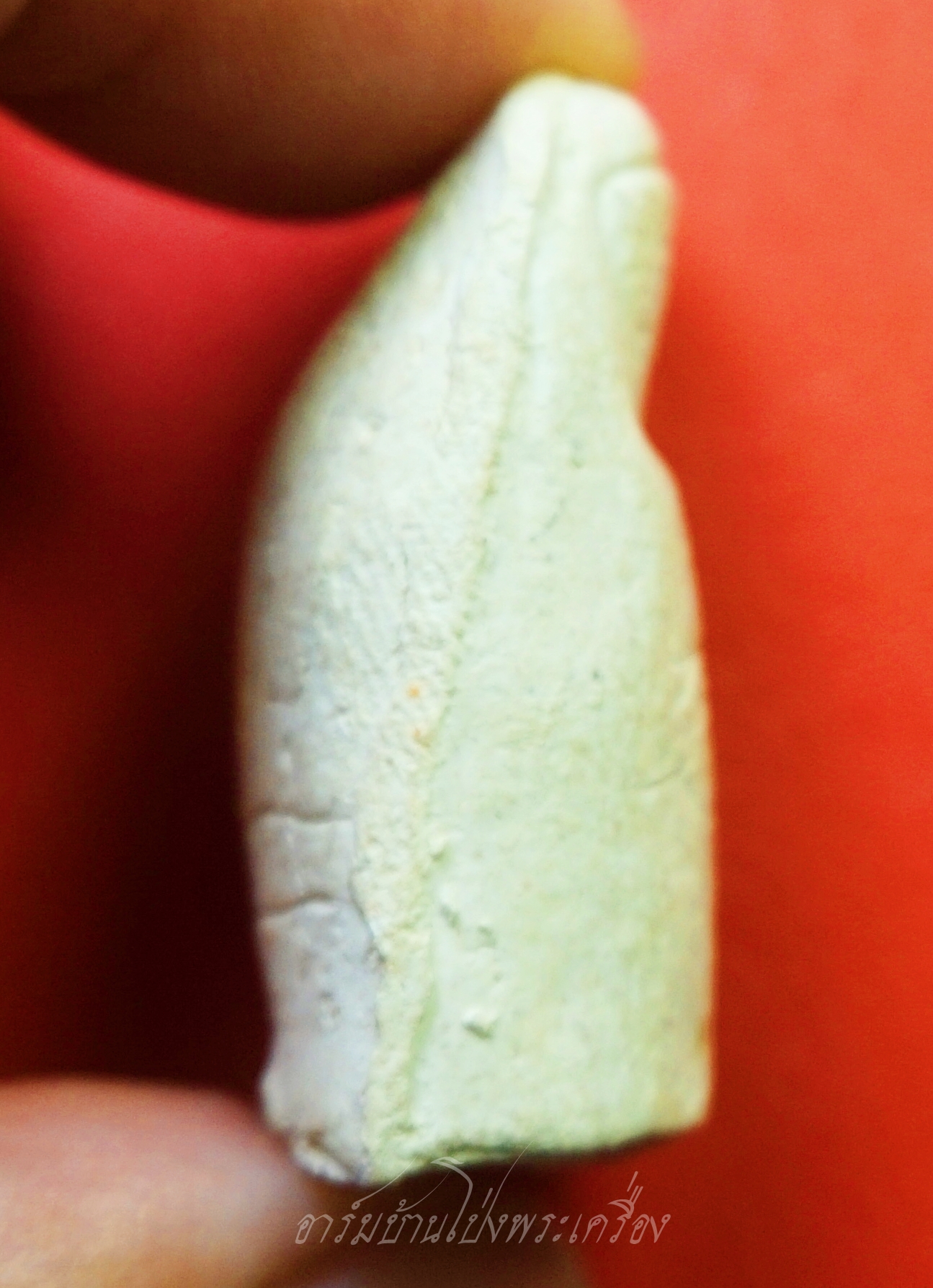 หลวงพ่อคูณ วัดบ้านไร่ นิ้วโป้งจำลอง ลงอักขระยันต์ ปี๒๕๓๖ เนื้อผง(องค์ที่10)