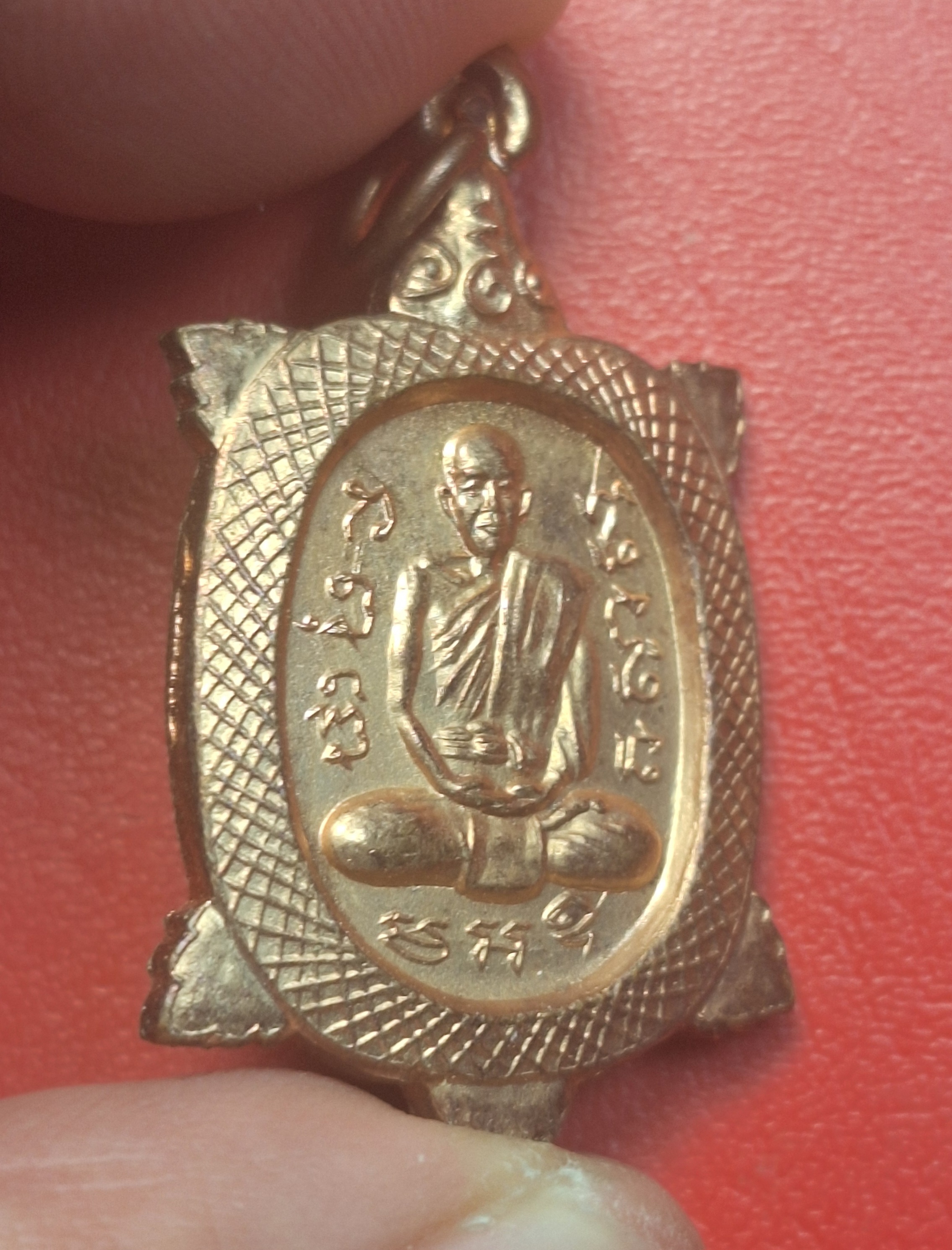 พระครูสันทัศน์กาญจนาภรณ์ วัดใหม่รางวาลย์กาญจนนิมิต เหรียญเต่าหลังยันต์พญานาค เนื้อทองแดงผิวไฟ(องค์ที่1)