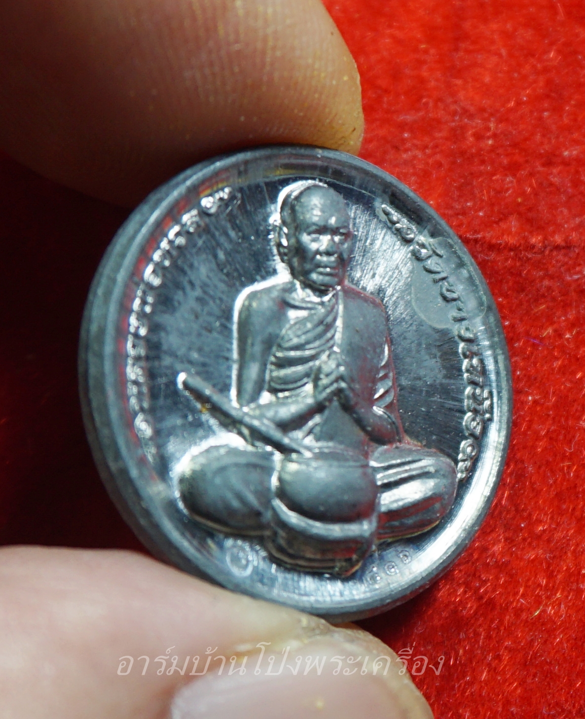 หลวงพ่อหวล วัดชาวเหนือ รุ่นทำน้ำมนต์ เนื้อตะกั่ว หลังหน้าเสือ(องค์ที่1)