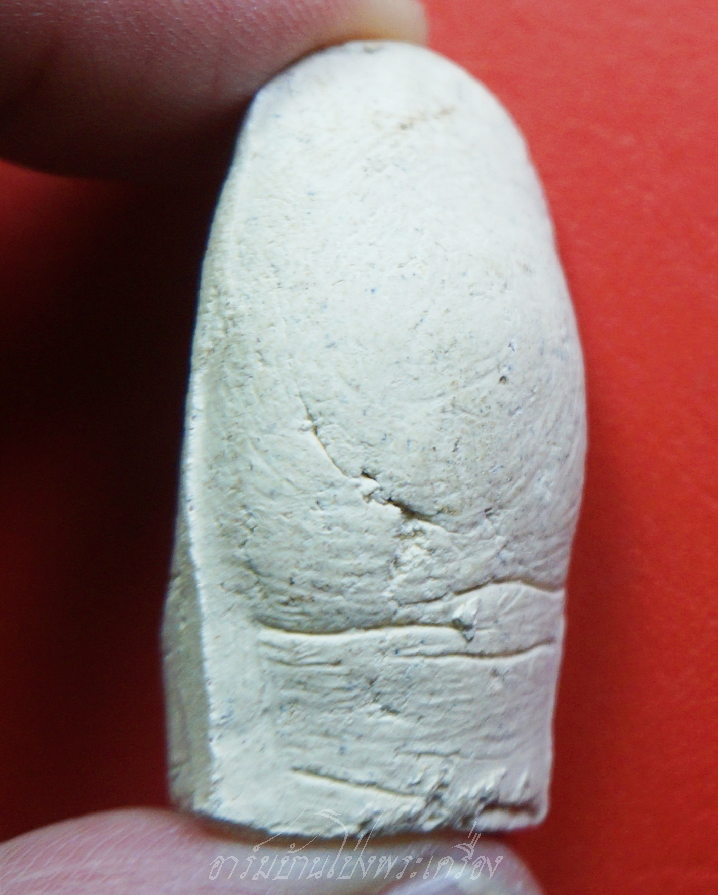 หลวงพ่อคูณ วัดบ้านไร่ นิ้วโป้งจำลอง ลงอักขระยันต์ ปี๒๕๓๖ เนื้อผง(องค์ที่16)