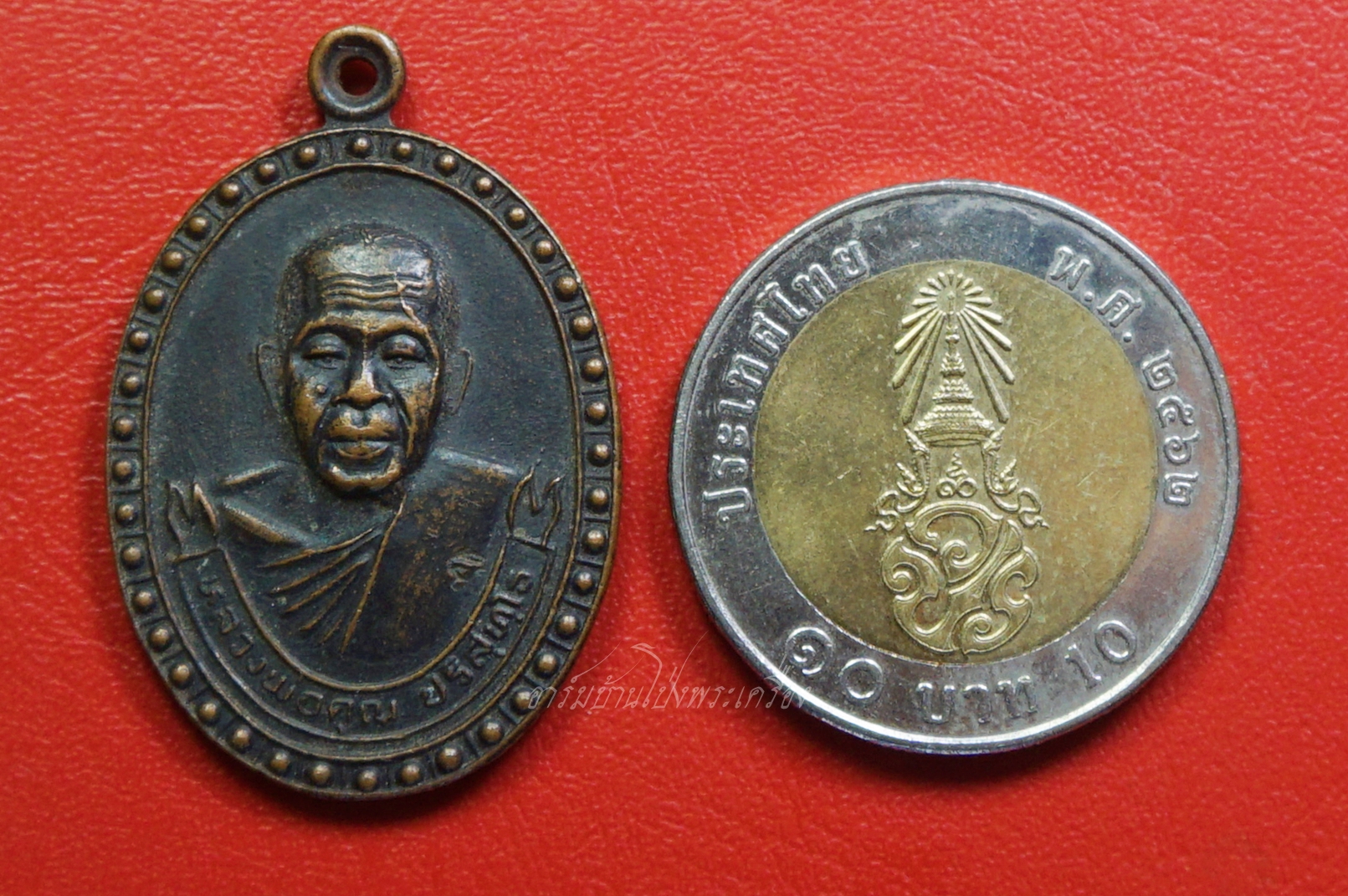 หลวงพ่อคูณ รุ่นสร้างพระวิษณุกรรม วิทยาลัยเทคนิคชัยภูมิ ปี๒๕๓๖ เนื้อทองแดงรมดำ ตอกโค๊ต(องค์ที่1)