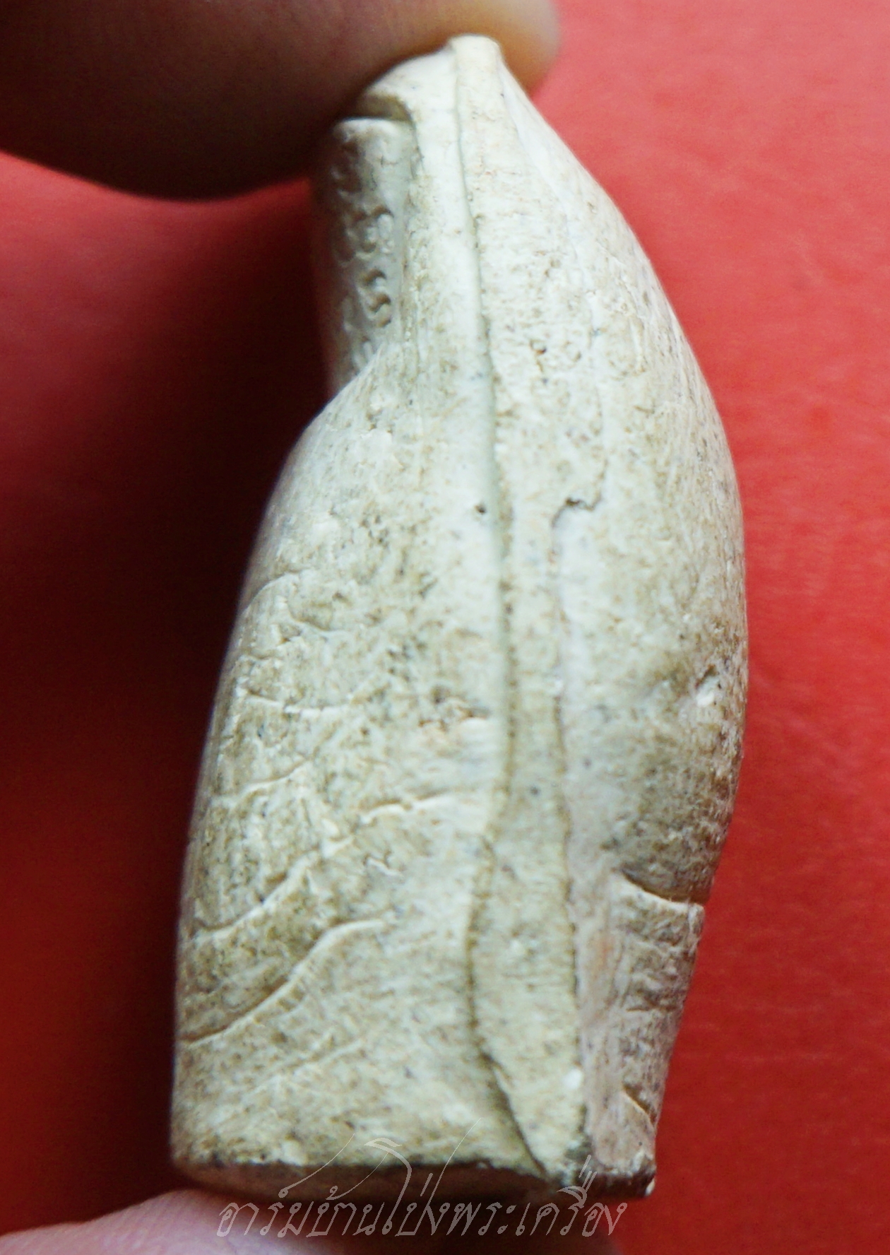 หลวงพ่อคูณ วัดบ้านไร่ นิ้วโป้งจำลอง ลงอักขระยันต์ ปี๒๕๓๖ เนื้อผง(องค์ที่13)