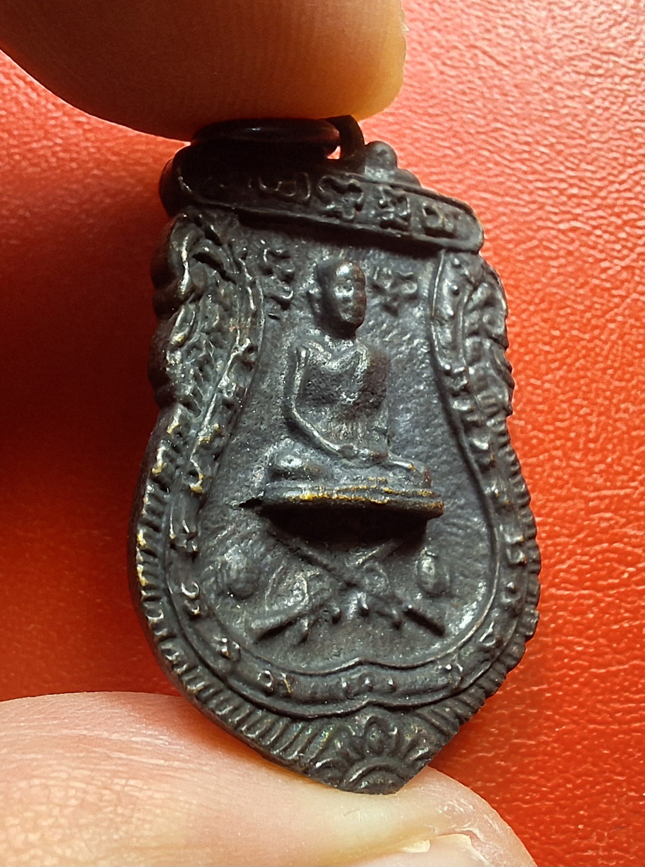 หลวงพ่อพุฒ วัดกลางบางพระ เหรียญหล่อนั่งปืน เนื้อทองแดง(องค์ที่2)