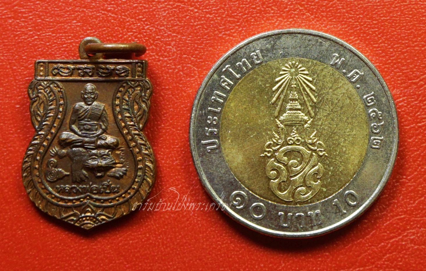 หลวงพ่อเปิ่น วัดบางพระ หลังนางกวัก ปี๒๕๕๔ เสมาเล็ก เนื้อทองแดง(องค์ที่3)