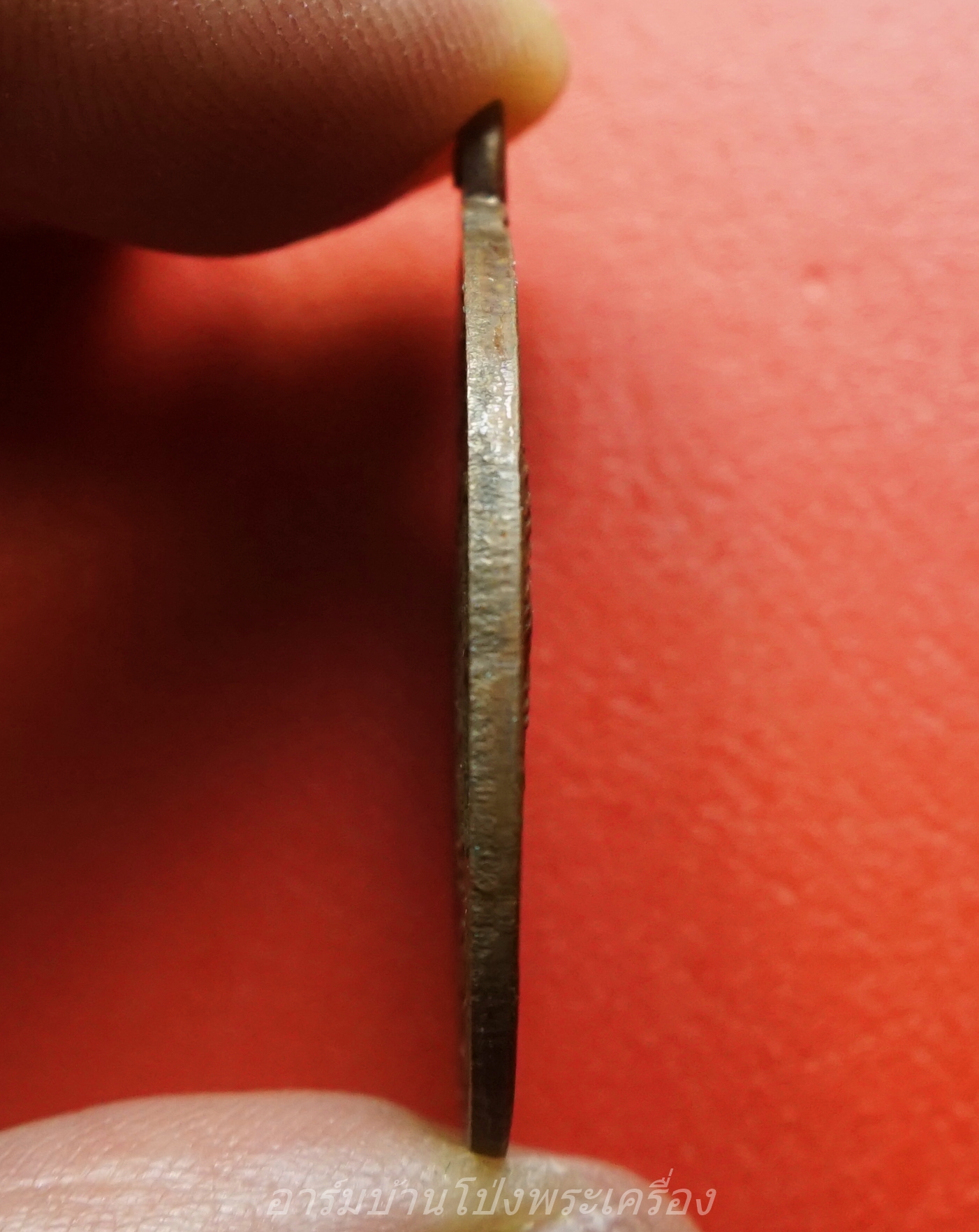 หลวงพ่อโก๊ะ วัดเก้าห้อง รุ่นปฏิสังขรอุโบสถ ปี๒๕๓๔ ขาไป เนื้อทองแดง(องค์ที่5)