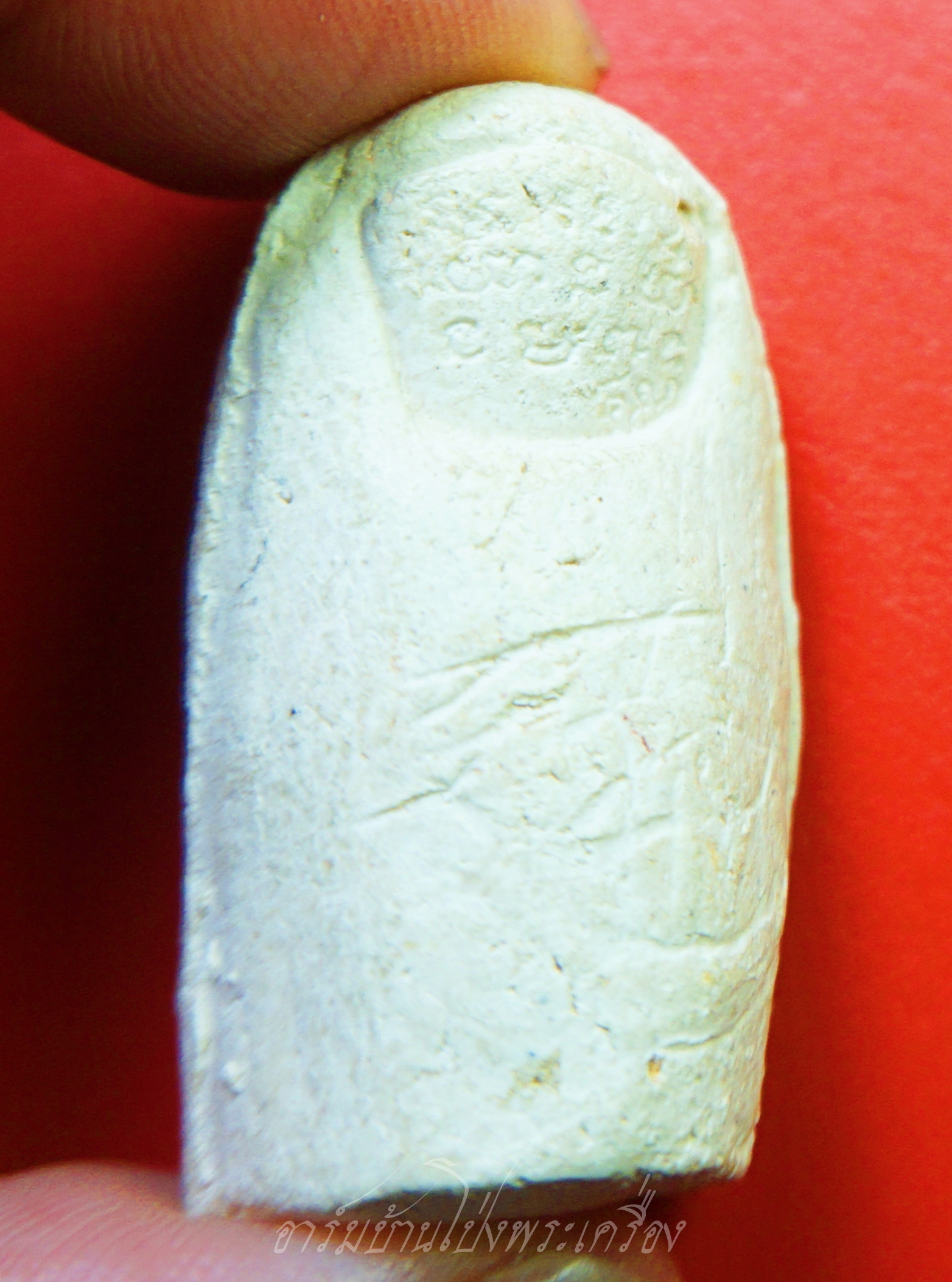 หลวงพ่อคูณ วัดบ้านไร่ นิ้วโป้งจำลอง ลงอักขระยันต์ ปี๒๕๓๖ เนื้อผง(องค์ที่10)