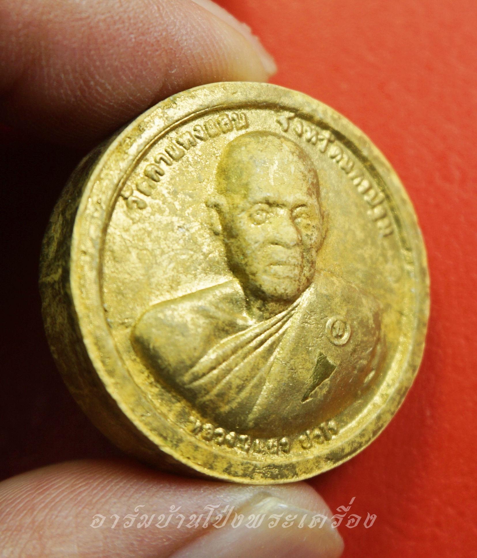 หลวงปู่แผ้ว วัดกำแพงแสน พระพิฆเนศ ด้านหน้าฝังตะกรุด เนื้อผงทาทอง(องค์ที่1)