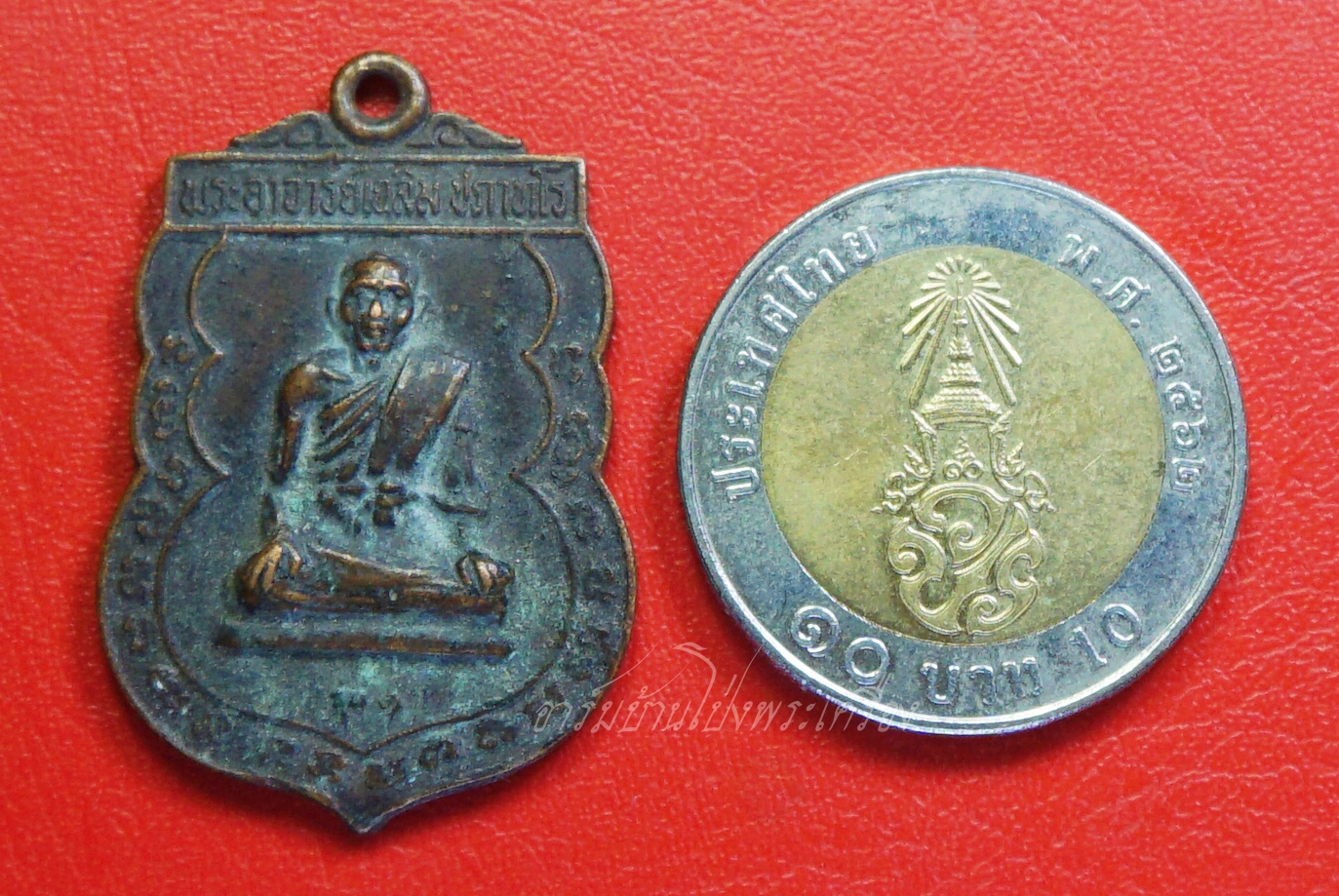 พระอาจารย์เฉลิม วัดเนินม่วง จ.ราชบุรี รุ่น๑ ปี๒๕๒๒ เนื้อทองแดงรมดำ(องค์ที่1)