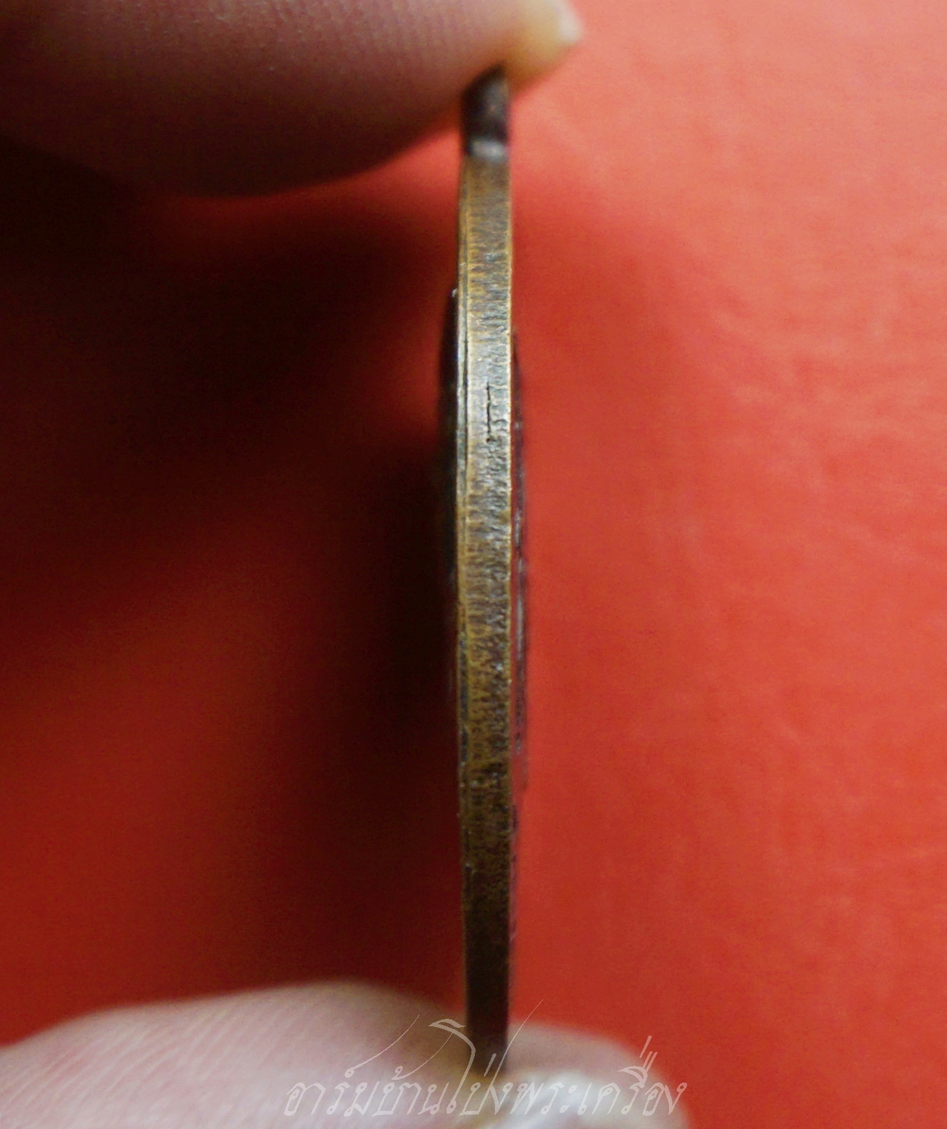 พระอาจารย์พีระ วัดเขาตอง จ.นครสวรรค์ รุ่น๑ เนื้อทองแดงรมดำ(องค์ที่1)