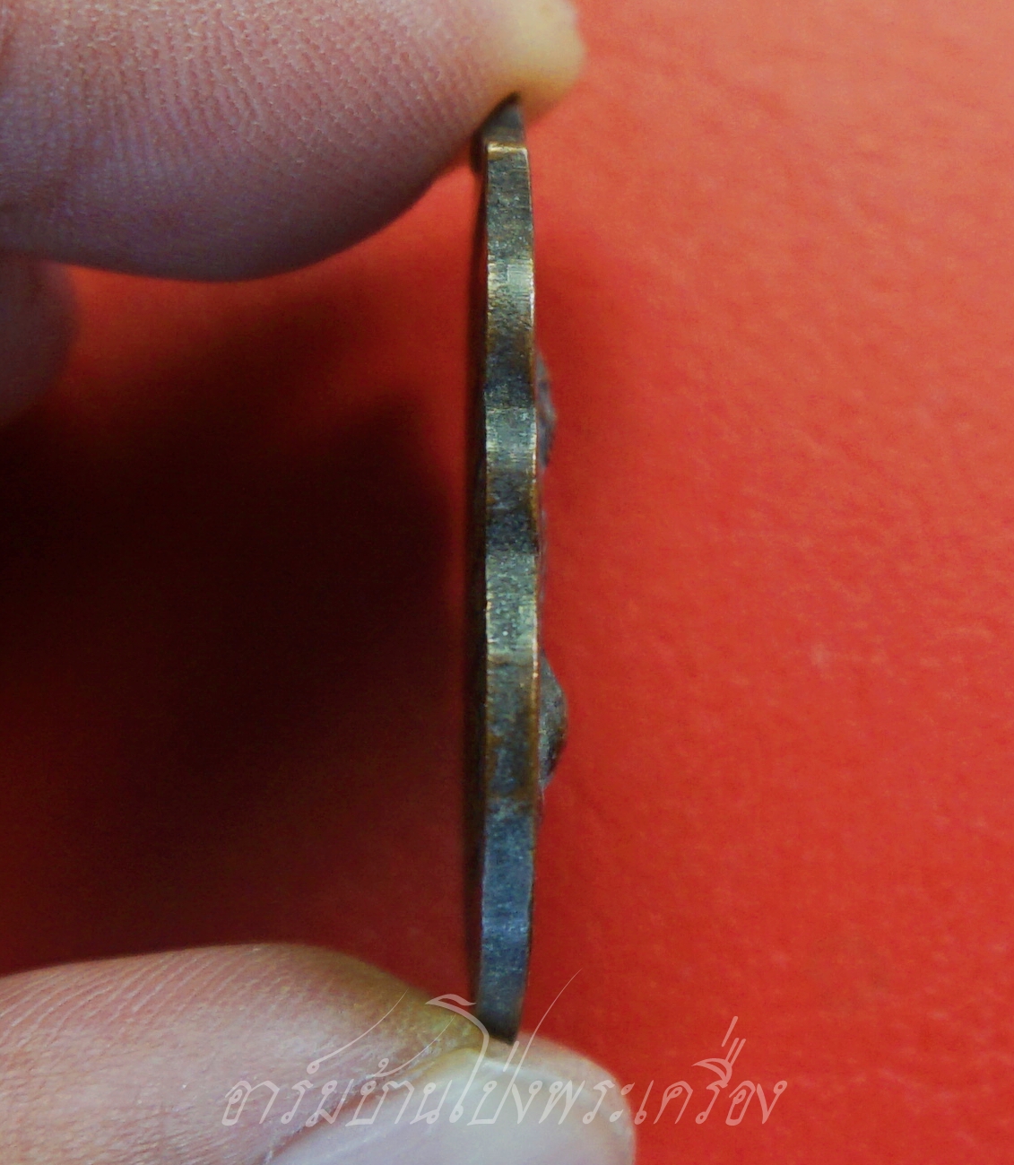 พระอาจารย์เฉลิม วัดเนินม่วง จ.ราชบุรี รุ่น๑ ปี๒๕๒๒ เนื้อทองแดงรมดำ(องค์ที่1)