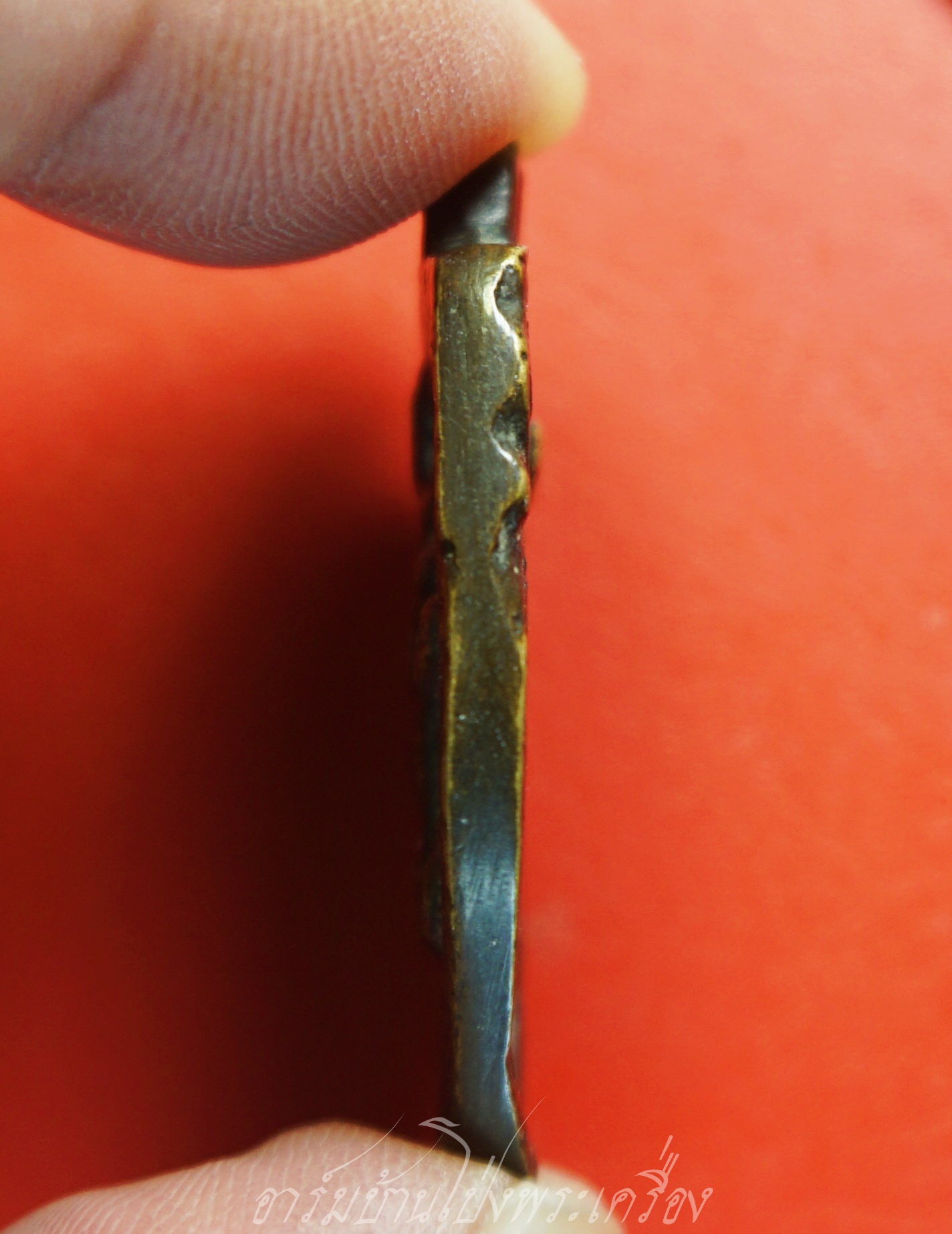 หลวงพ่อแบ๋ม วัดรางวาลย์ เหรียญหล่อ ปี๒๕๑๒ เนื้อทองเหลืองรมดำ(องค์ที่1)