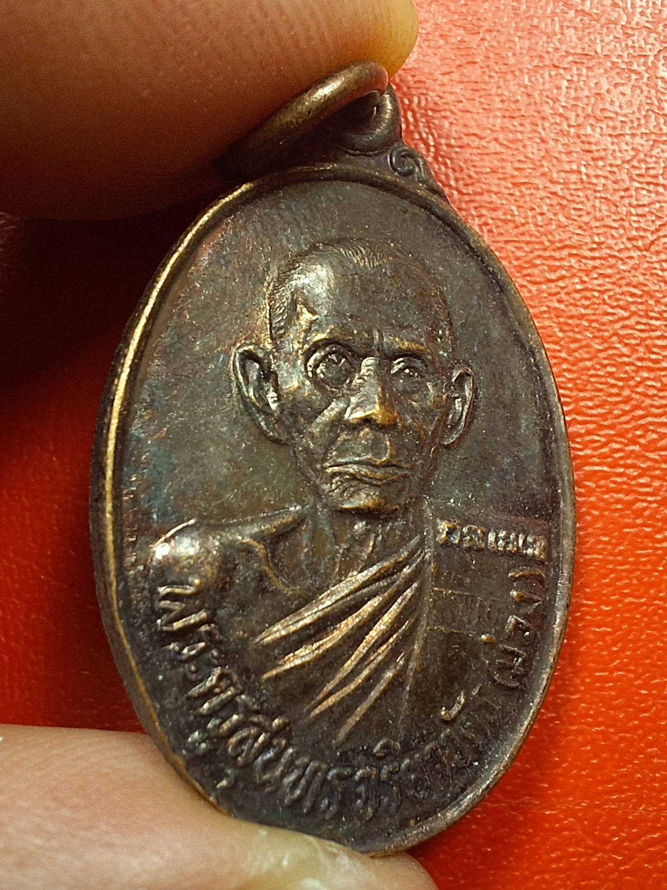 หลวงปู่ม่วง วัดยางงาม จ.ราชบุรี รุ่นสอง ปี๒๕๓๕ อายุ๘๐ปี เนื้อทองแดงรมดำ(องค์ที่1)