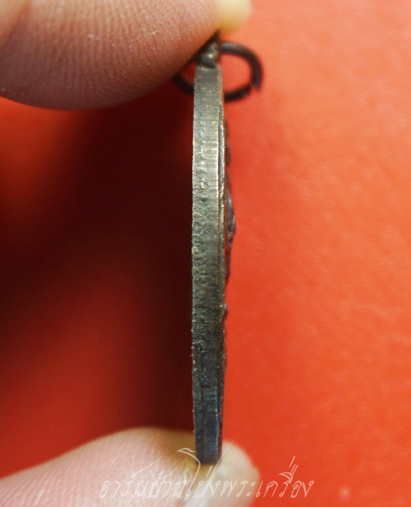 หลวงพ่อคูณ วัดบ้านไร่ รุ่นนั่งรถถัง ปี๒๕๓๘ เนื้อทองแดงรมดำ(องค์ที่1)