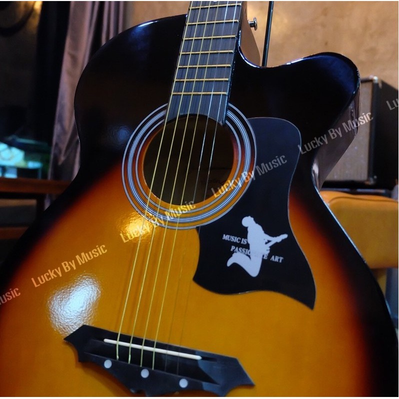 Martin Lee กีต้าร์โปร่ง 38 นิ้ว สีซันเบิร์น มีเหล็กดามคอ แถมฟรี กระเป๋า ปิ๊ก ที่เก็บปิ๊ก จูนเนอร์ สายสะพายและใบคอร์ด