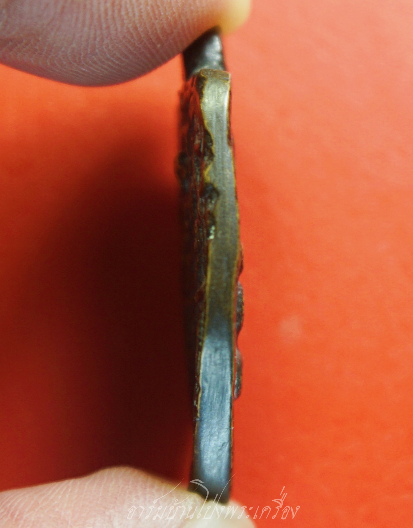 หลวงพ่อแบ๋ม วัดรางวาลย์ เหรียญหล่อ ปี๒๕๑๒ เนื้อทองเหลืองรมดำ(องค์ที่1)