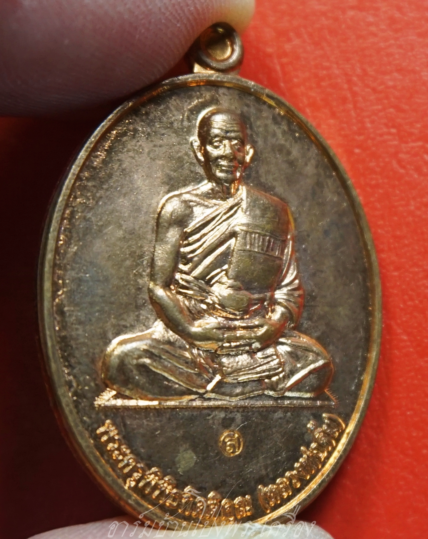 หลวงพ่อคิ้ม วัดหนองเสือ อายุครบ๘๕ปี ปี๒๕๕๕ เนื้อทองแดงผิวไฟ(องค์ที่1)