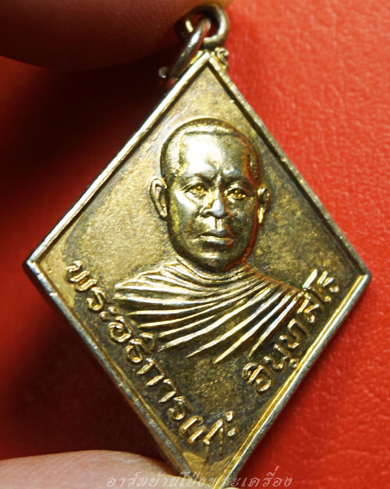 พระอธิการแกะ วัดเลาเต่า เนื้อกะไหล่ทอง(องค์ที่1)