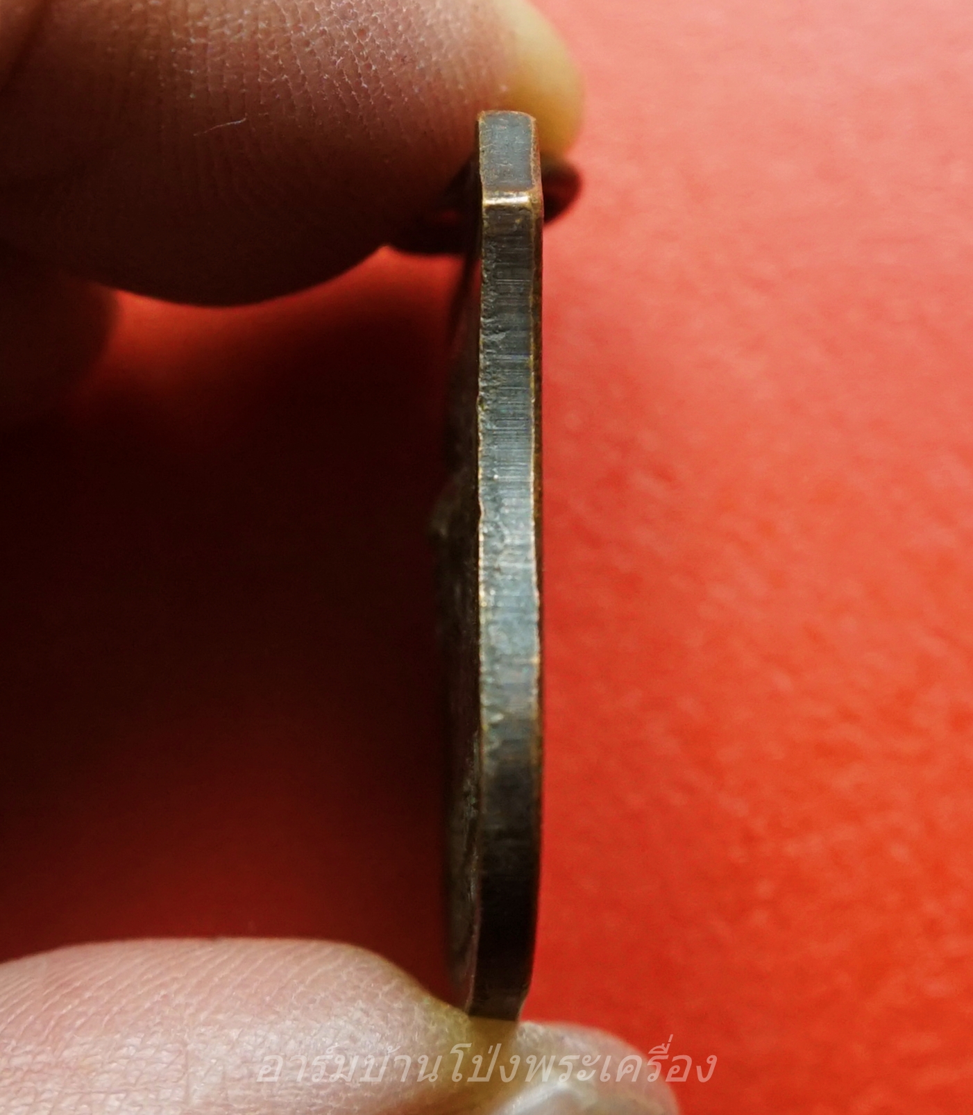 หลวงพ่อวัดคู วัดคู หลัง หลวงพ่อเสี้ยน ปภากโร เป็นเหรียญทรงโลห์ ปี ๒๕๔๔ เนื้อทองแดง(องค์ที่1)