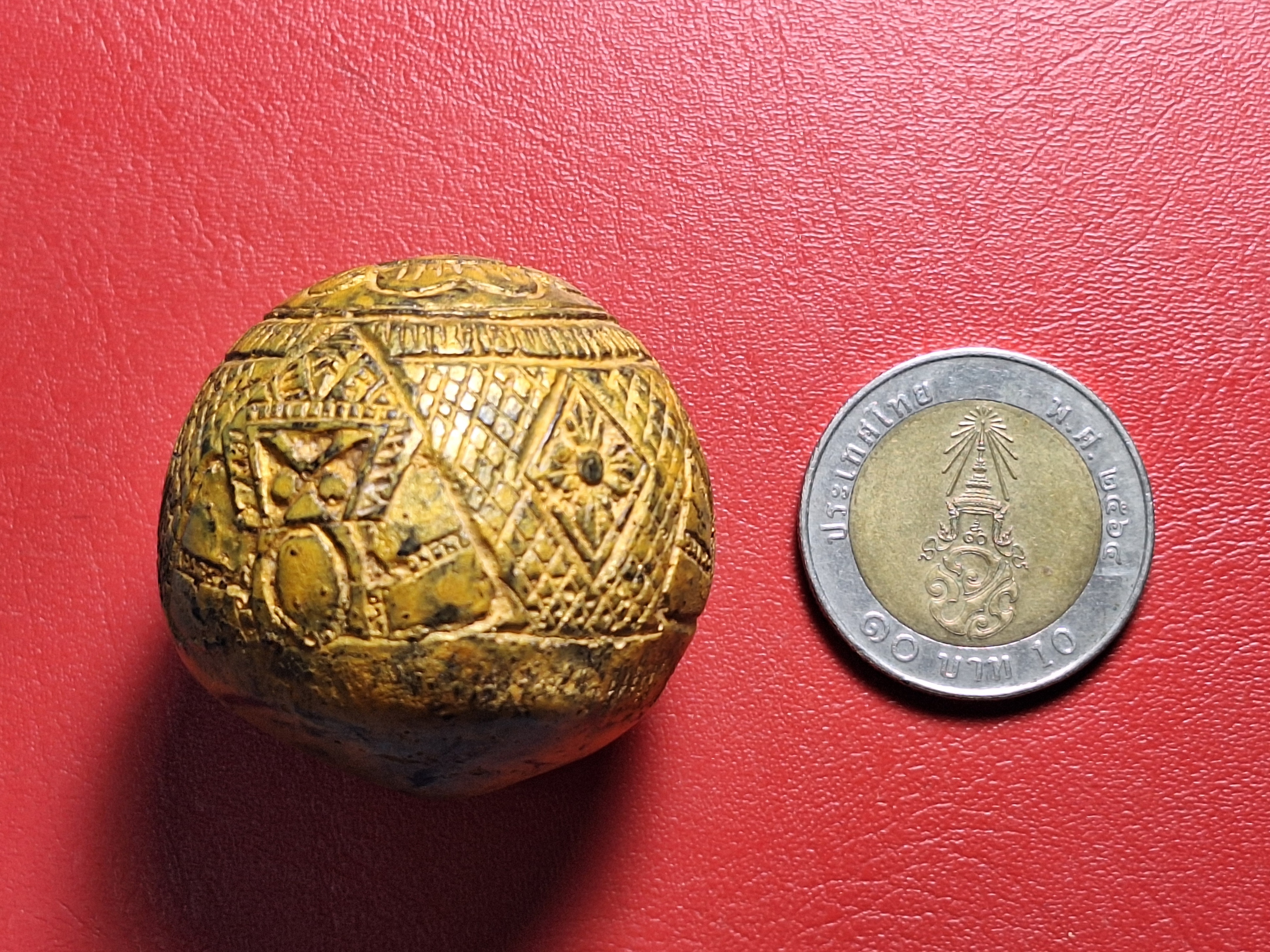 คตมะพร้าวสุดยอดของมงคลศักสิทธิ์ ป้องกันไสยศาสตร์ทุกชนิด เขย่ามีเสียงดัง แกะเป็นรูปราหู 3 หน้า(องค์ที่3)