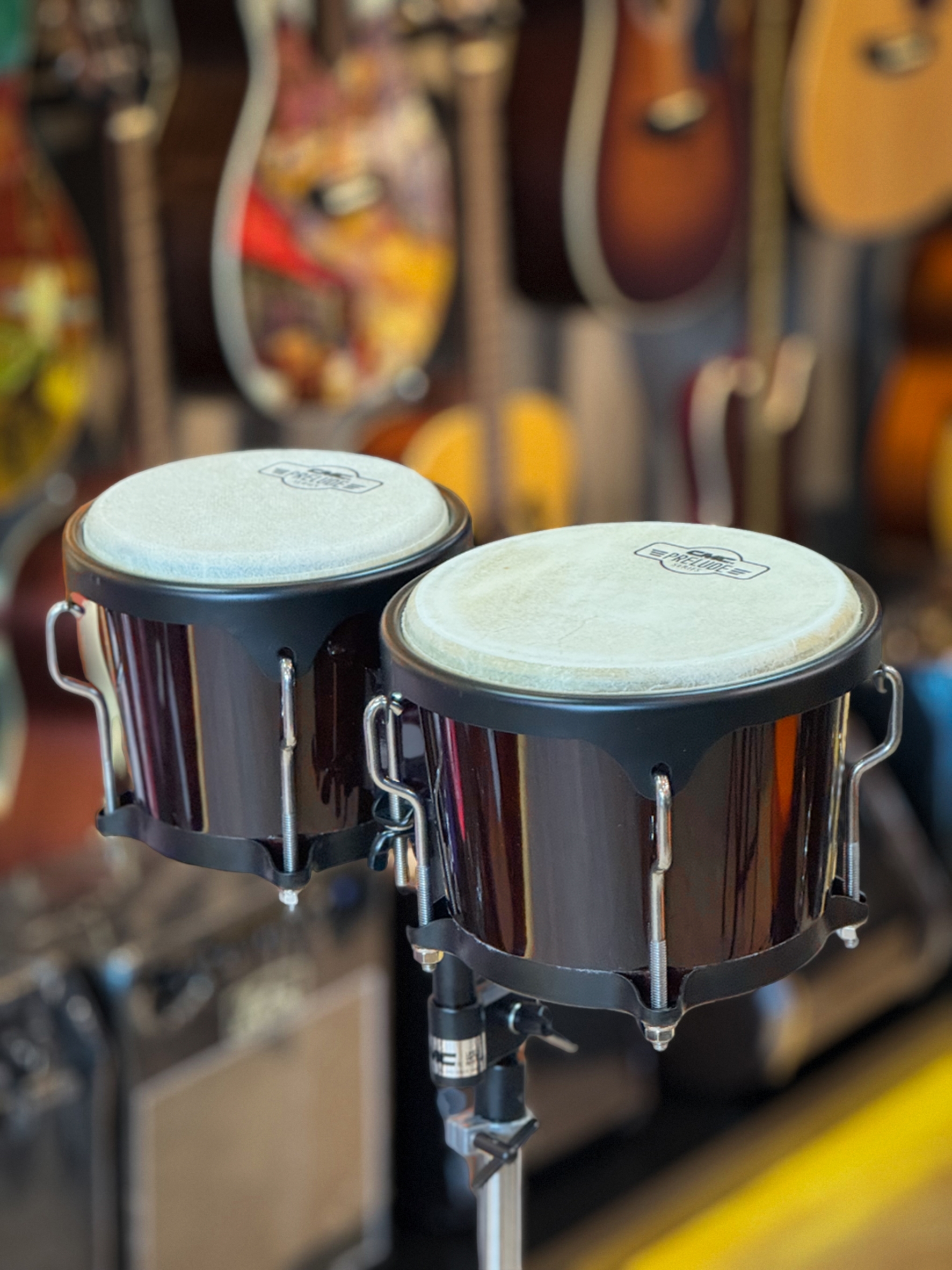 กลองบองโก้ CMC ลายสุดชิค ทำจากหนังแท้อย่างดี ดังชัดเจนทุกจังหวะ ฟรี ขาตั้ง/ประแจ - ของแท้100%