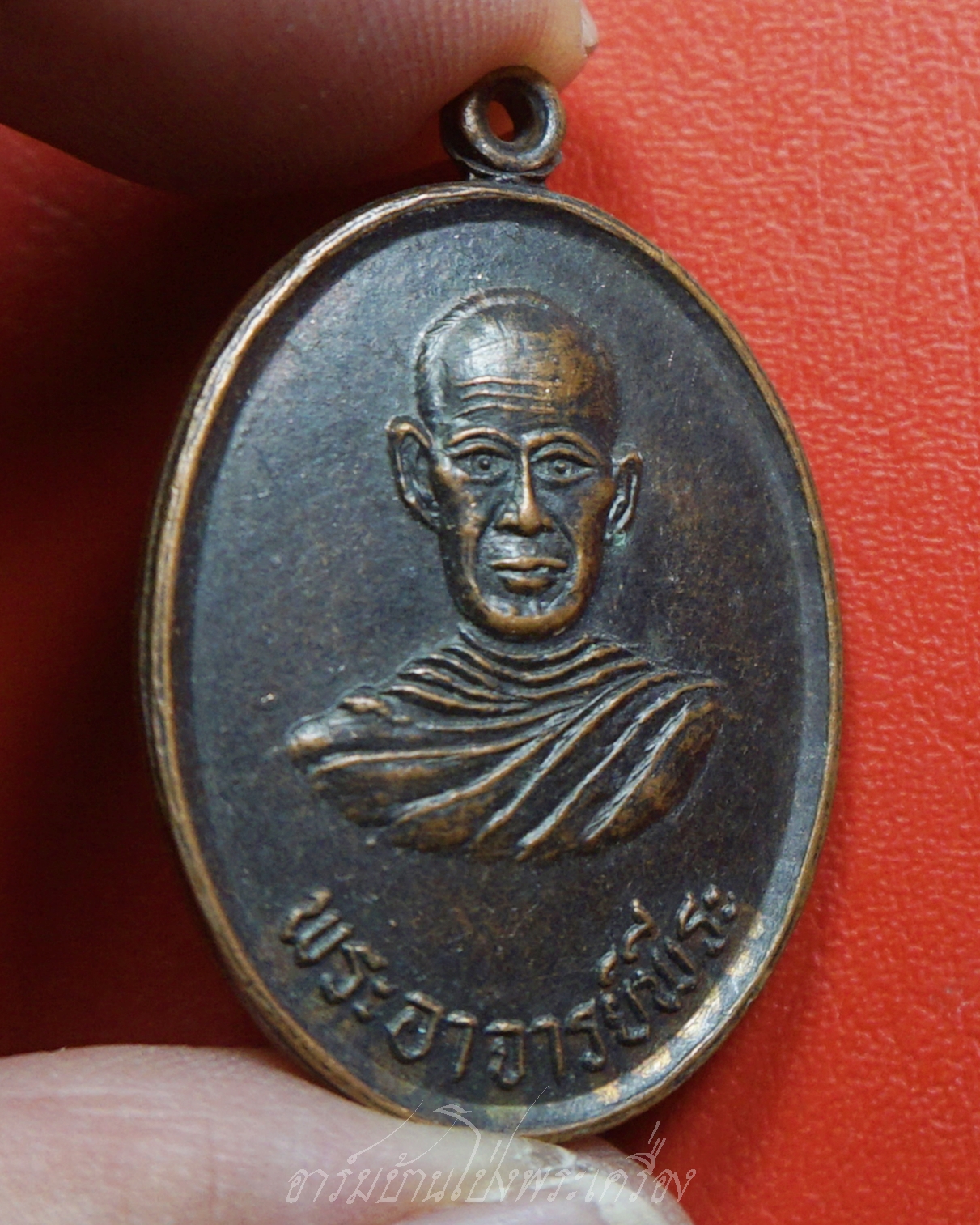 พระอาจารย์พีระ วัดเขาตอง จ.นครสวรรค์ รุ่น๑ เนื้อทองแดงรมดำ(องค์ที่1)