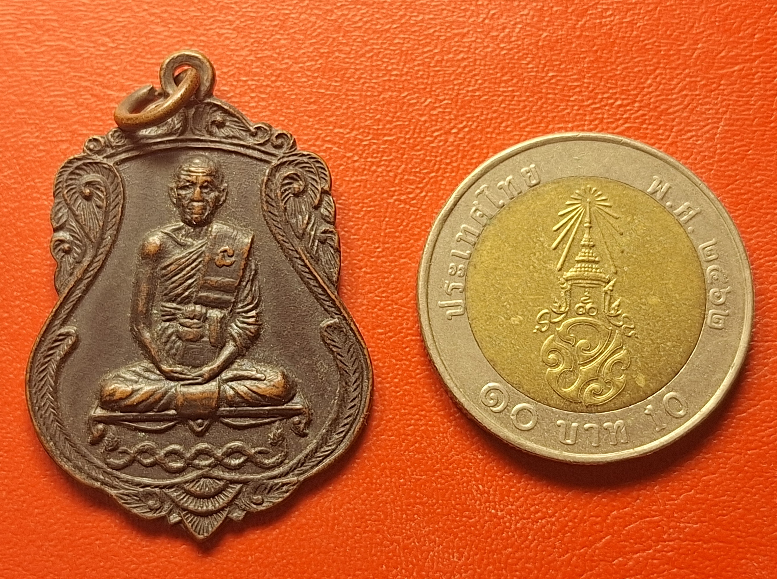 หลวงพ่อคูณ วัดจอมบึง รุ่นสาม ปี๒๕๑๗ เนื้อทองแดงรมดำ(องค์ที่15)