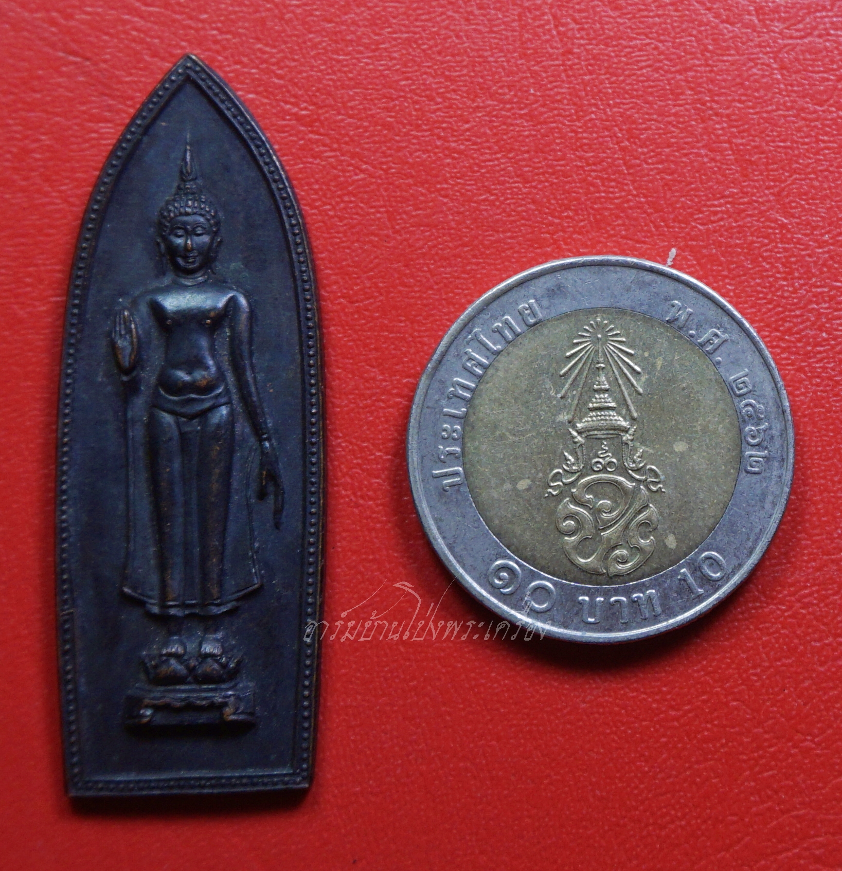 พระร่วงฤทธิโรจน์ หลวงพ่อเล็ก วัดสันติคีรีศรีบรมธาตุ(เขาดิน) จ.กาญจนบุรี เนื้อทองแดงรมดำ(องค์ที่1)