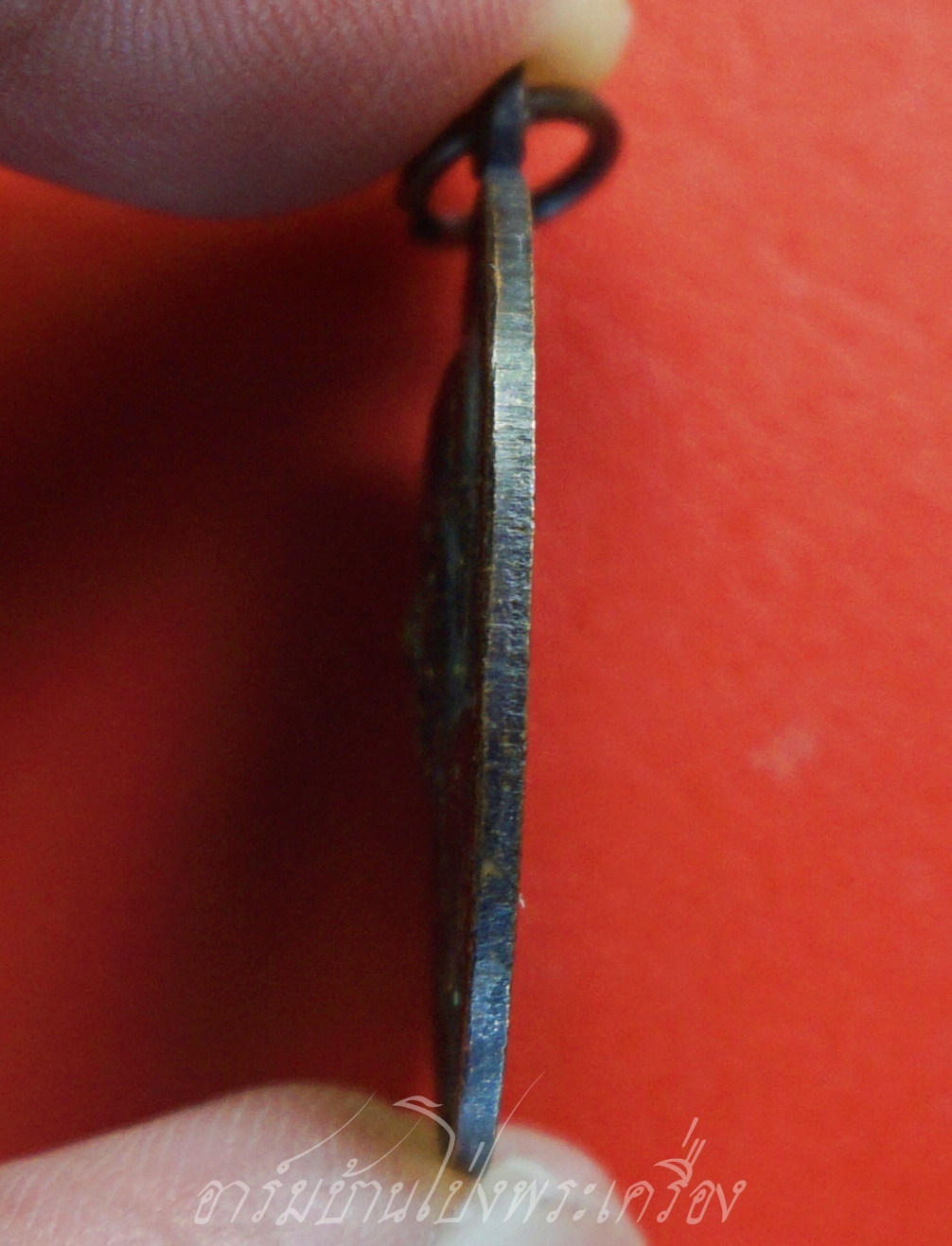 พระครูใบฎีกาพยากรณ์(ท้วม) วัดแสนสุข จ.ชลบุรี รุ่นปักกรดไม่ถอน เนื้อทองแดงรมดำ(องค์ที่1)