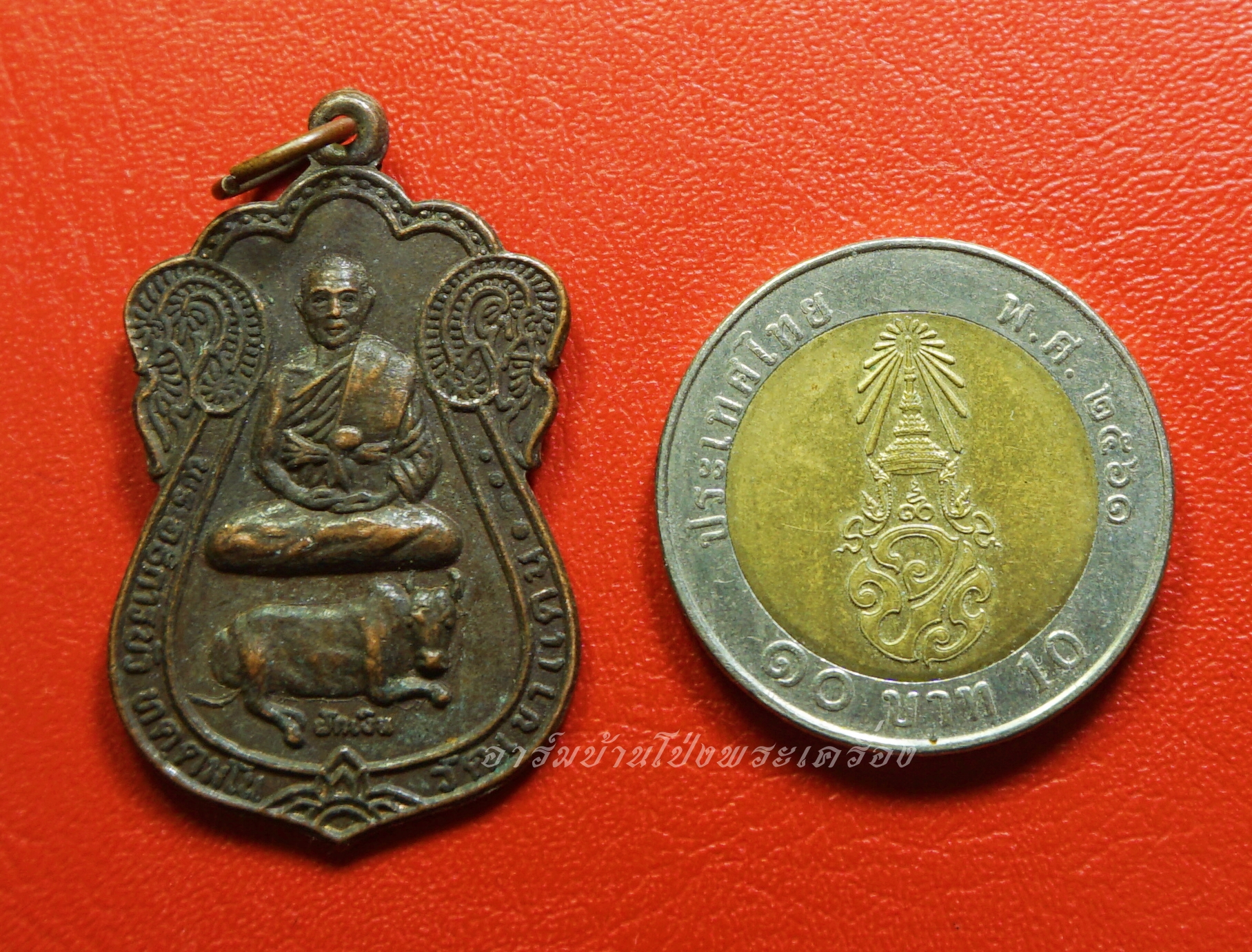 พระอธิการบัว วัดเขาแดน รุ่น๑ เนื้อทองแดง(องค์ที่8)